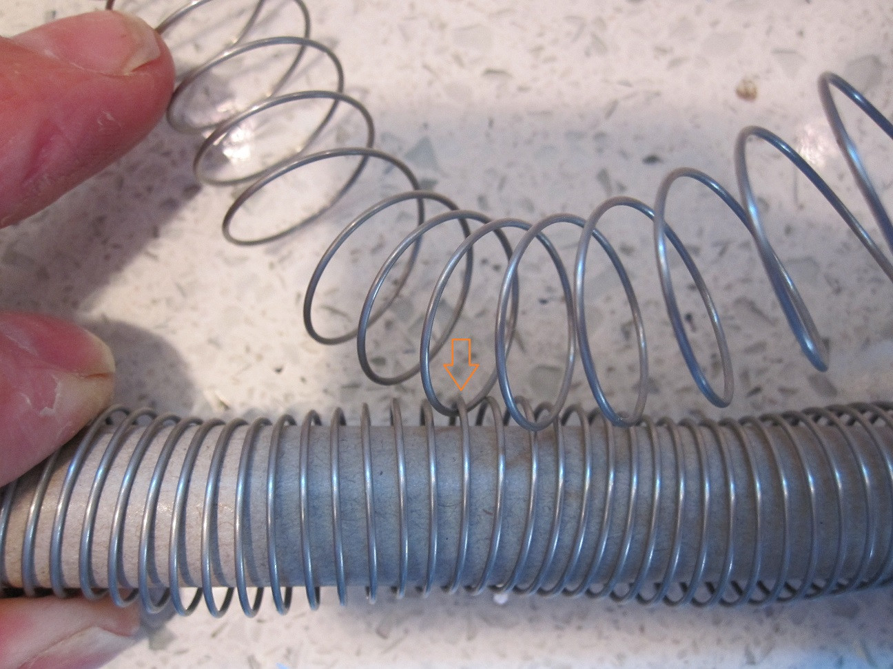 sink How to untangle spring for kitchen faucet hose? Home Improvement Stack Exchange