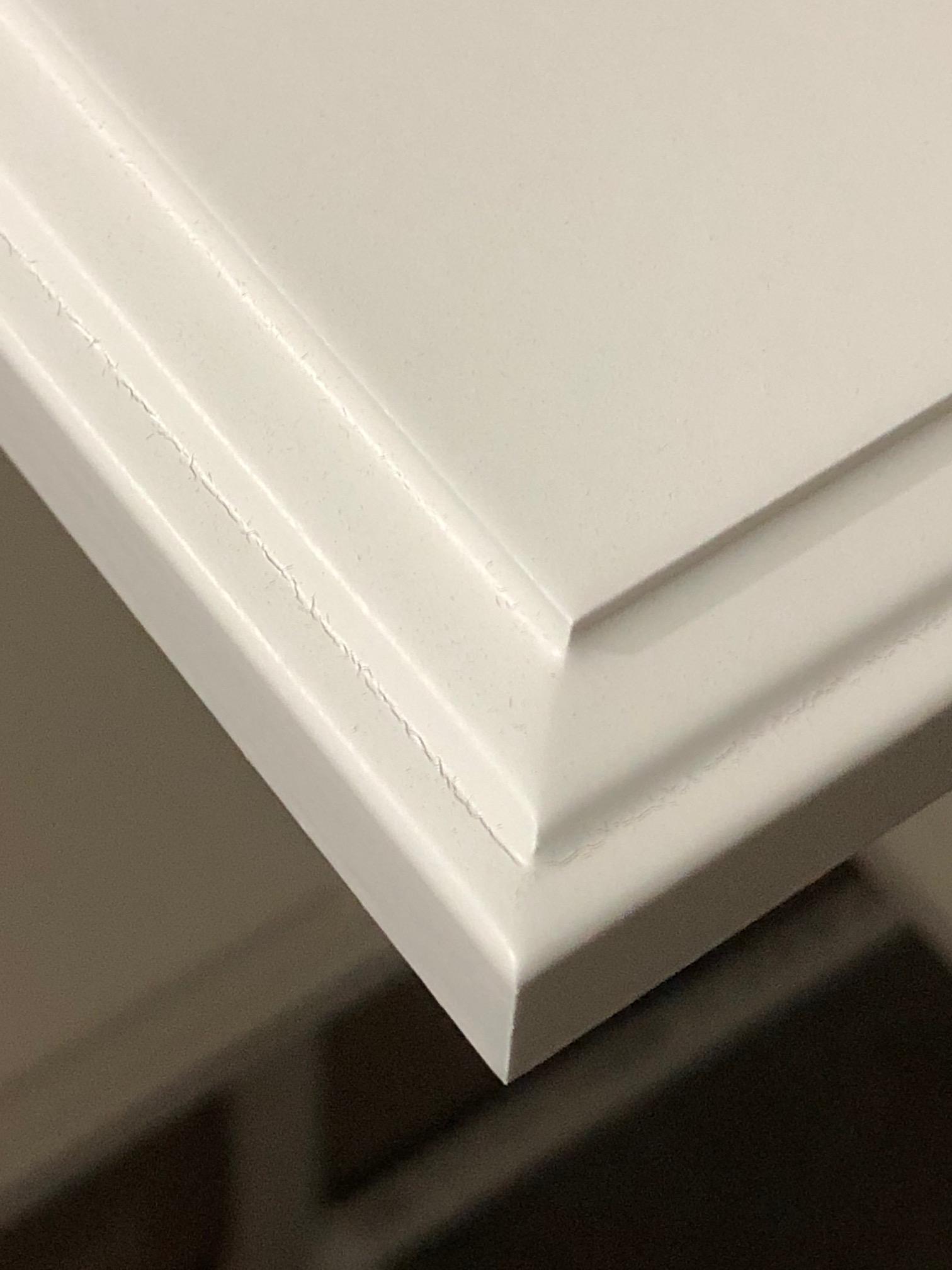 painting Why did my coat of spray paint crack along a profile line