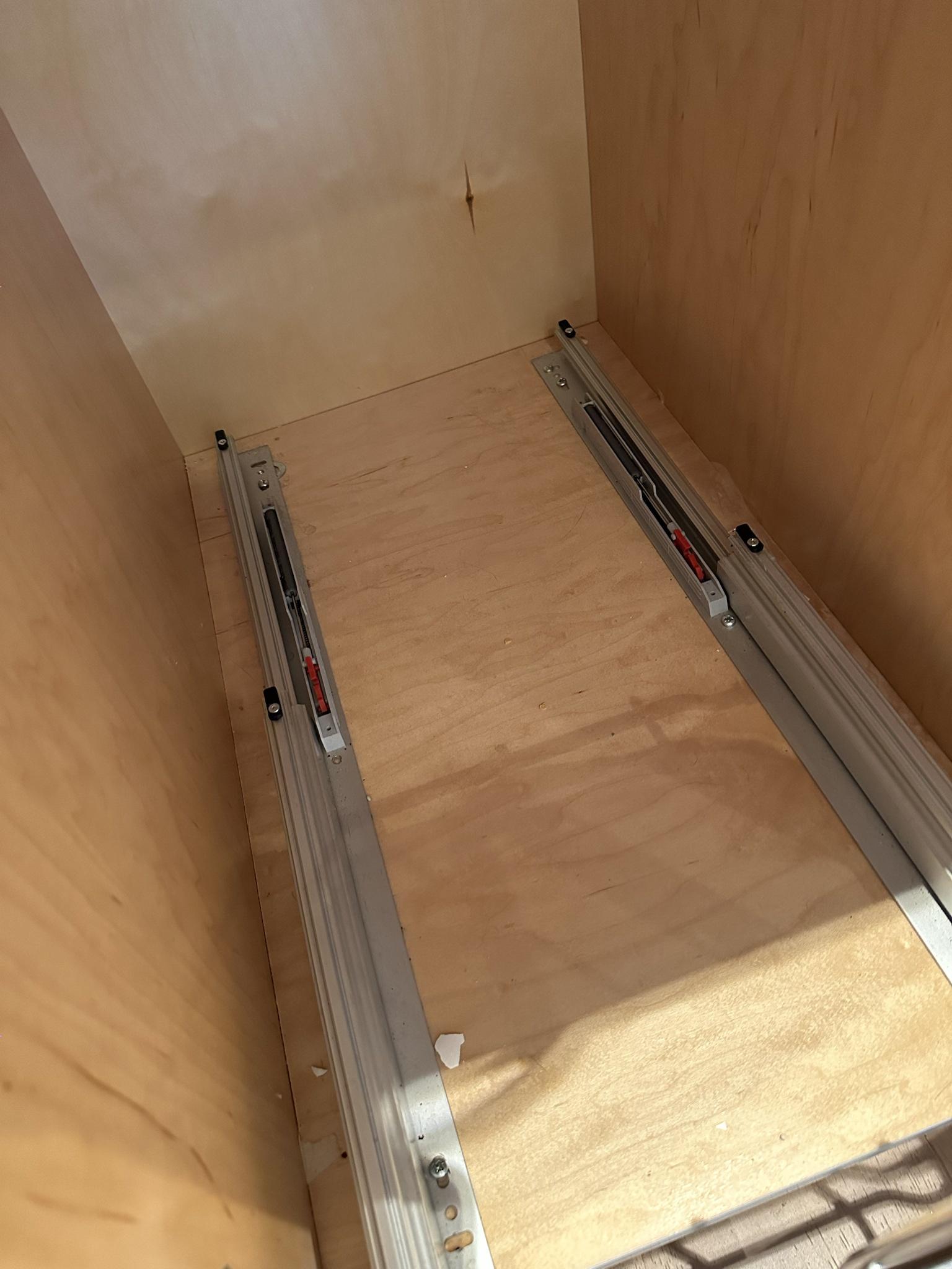 custom Pull out garbage drawer doesn’t pull out fully. How