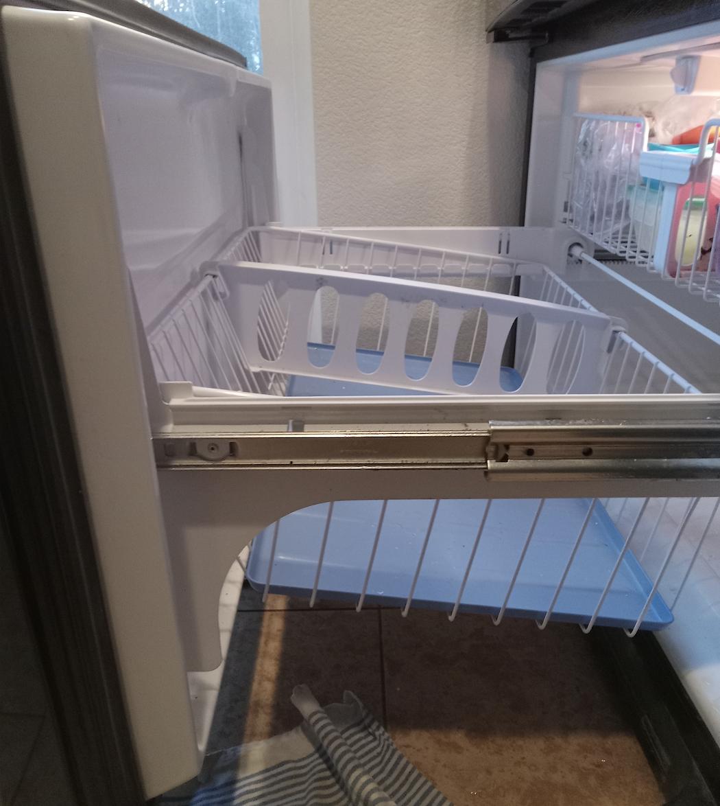 appliances Why is the drawer basket tilted in my refrigerator? Home