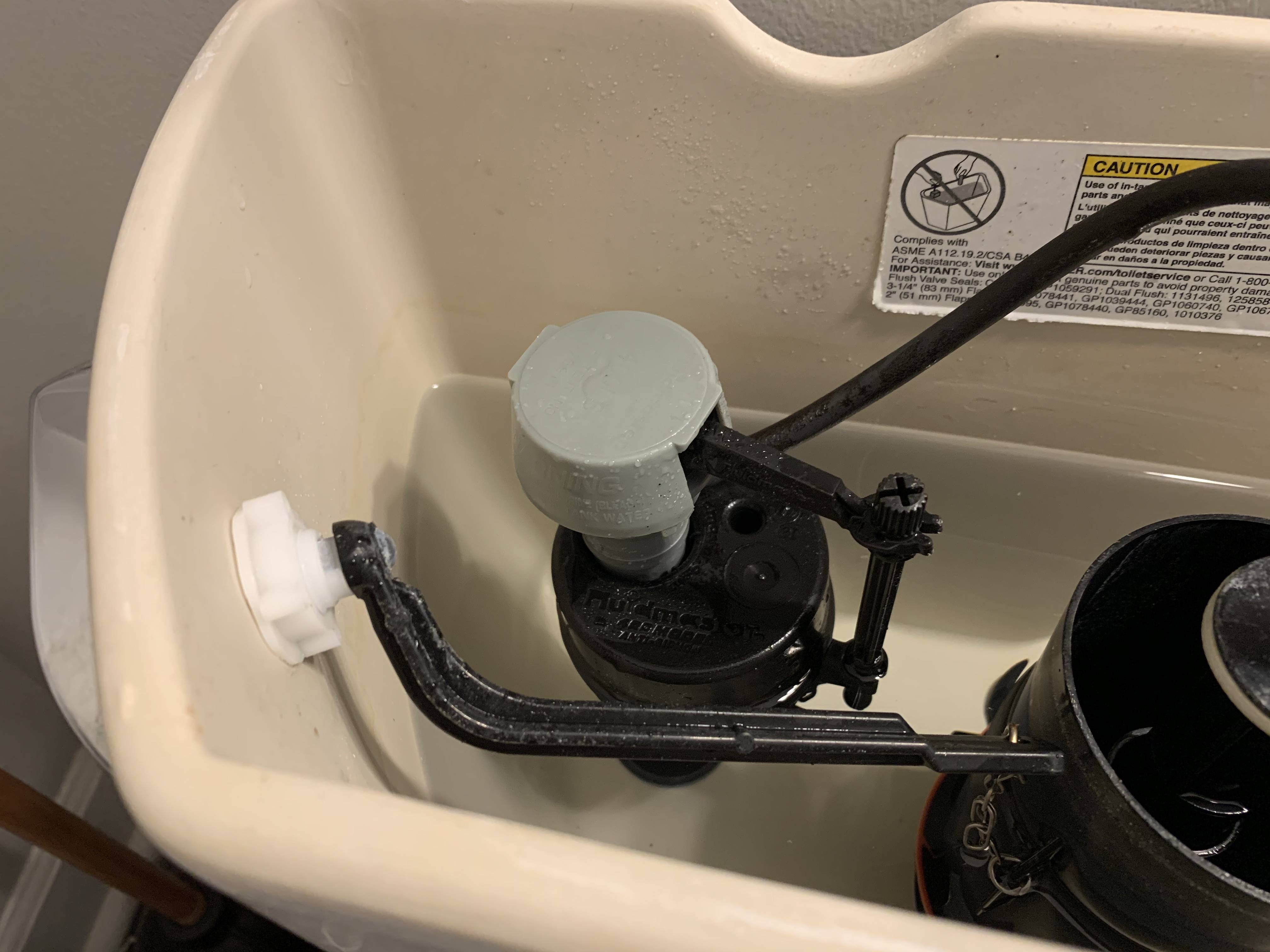 Why did the fill valve in my toilet pop up? Home Improvement Stack