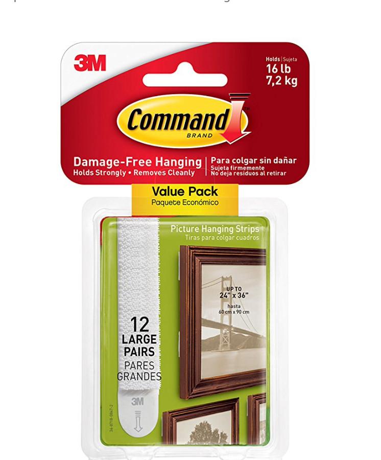 home How can I affix pictures/photos to a wall cleanly