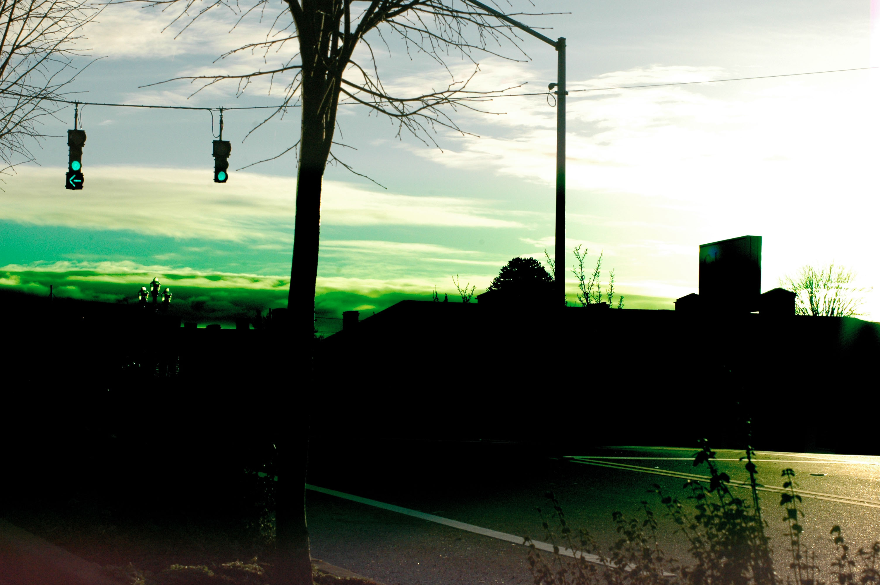 reverse engineering What caused the sky to turn green in this photo