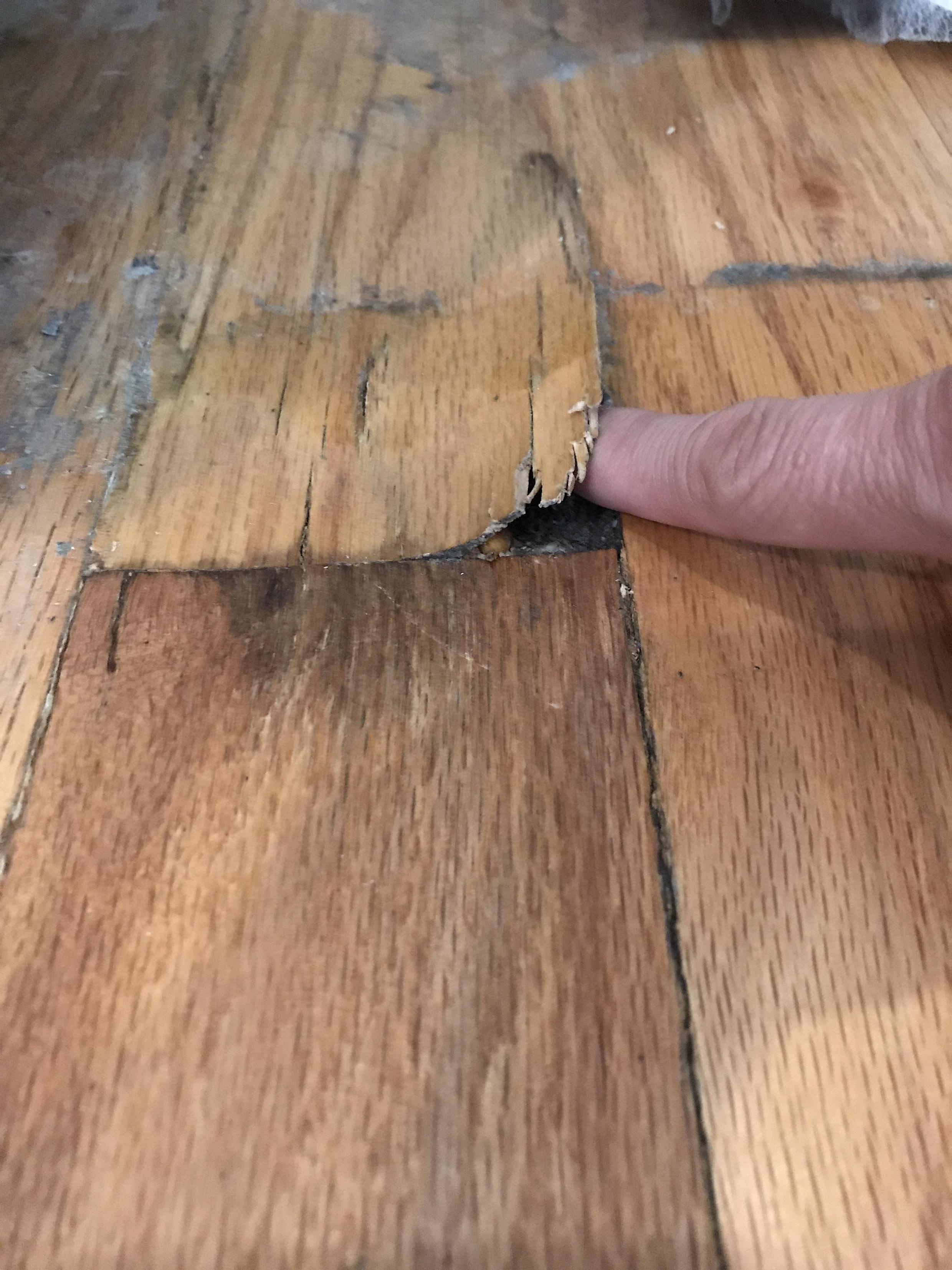 Do solid hardwood floors have top laminate layersor is this