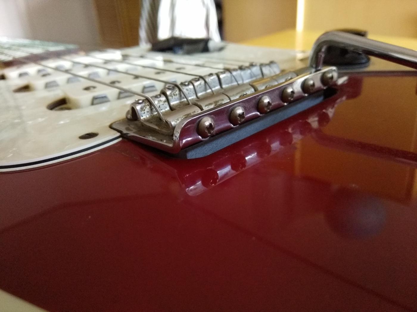 guitar bridge liftedup Music Practice & Theory Stack Exchange