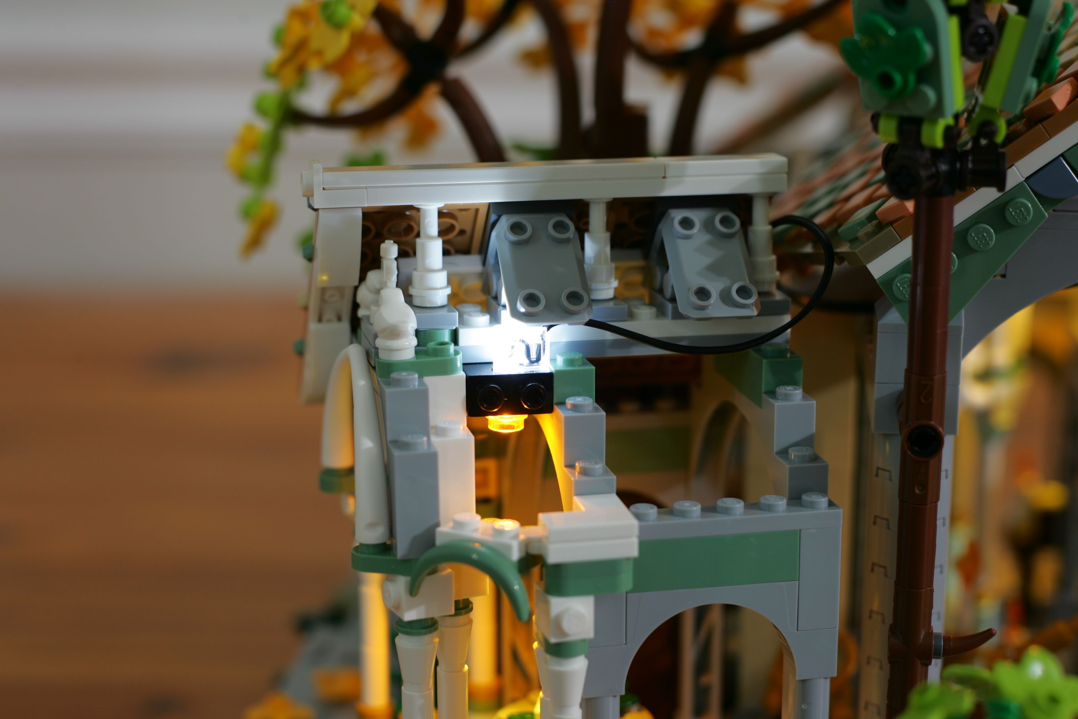 set modification - How could I add fire-like lighting to Rivendell