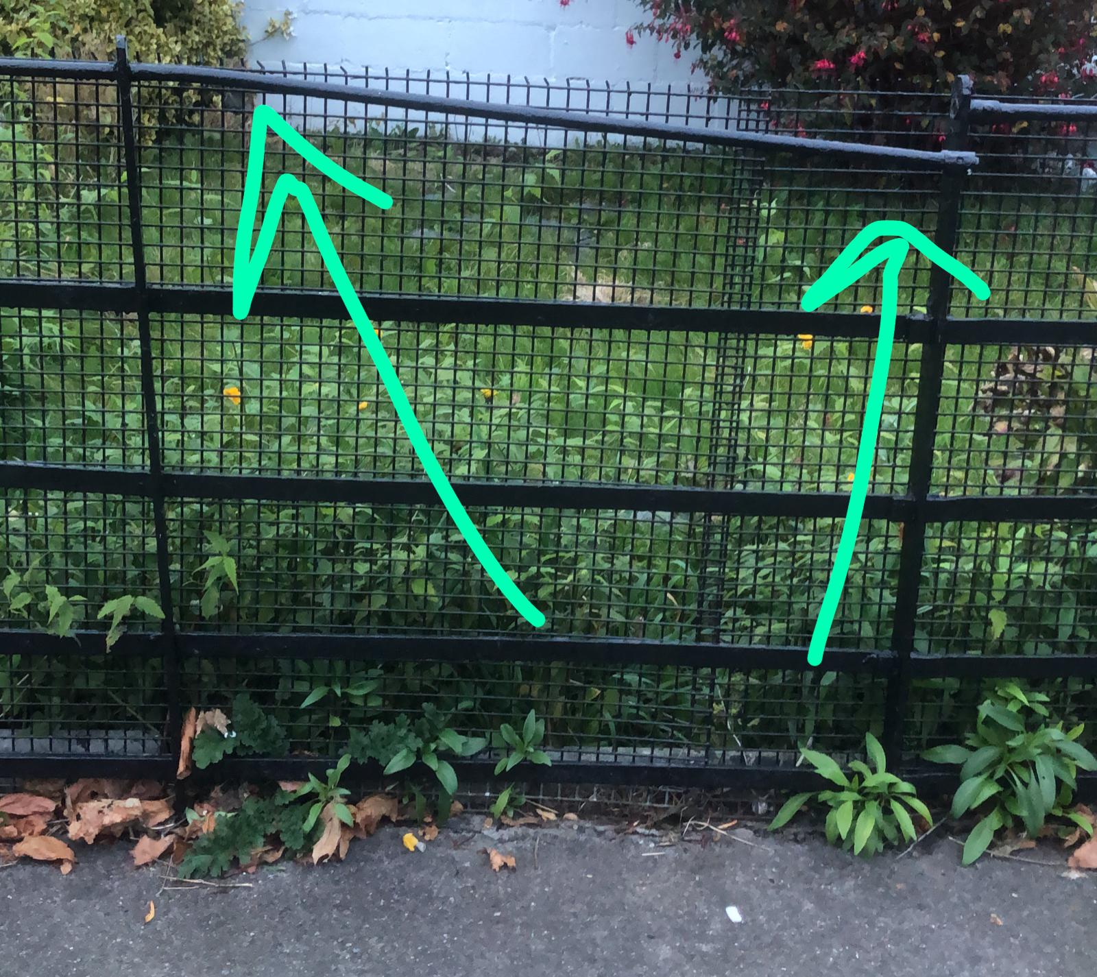Bending horizontal bars of Iron fence Love & Improve Life