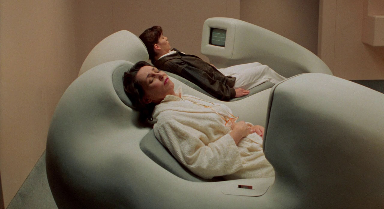 story identification Movie where a woman escapes from a dream pod