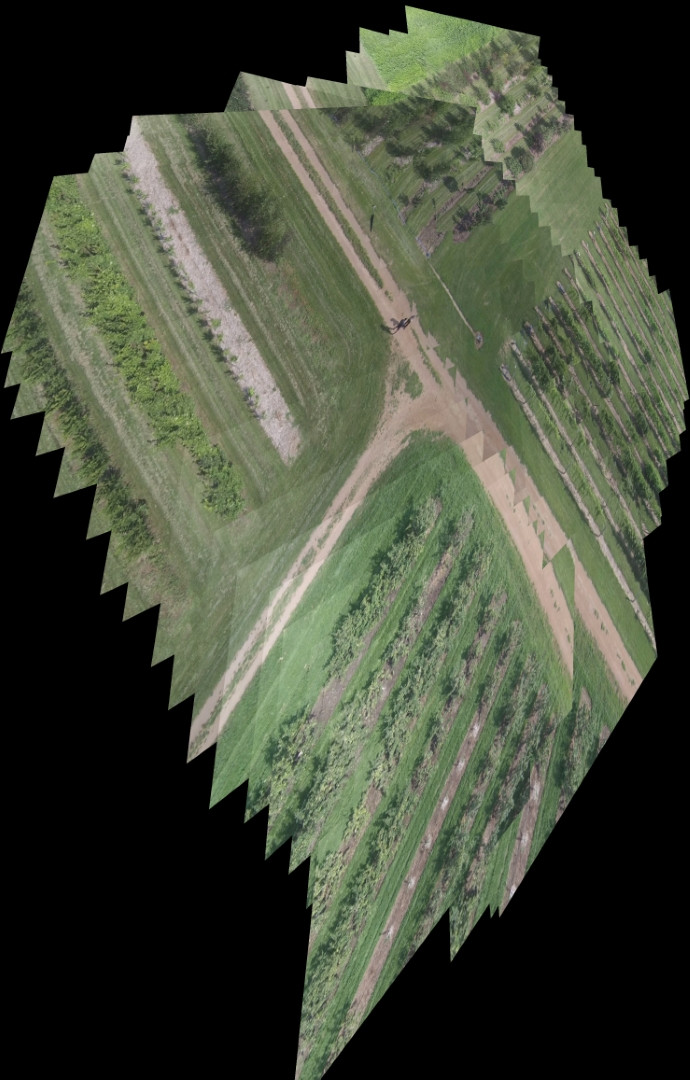 OpenCV, Python Perspective warping problem in aerial image stitching