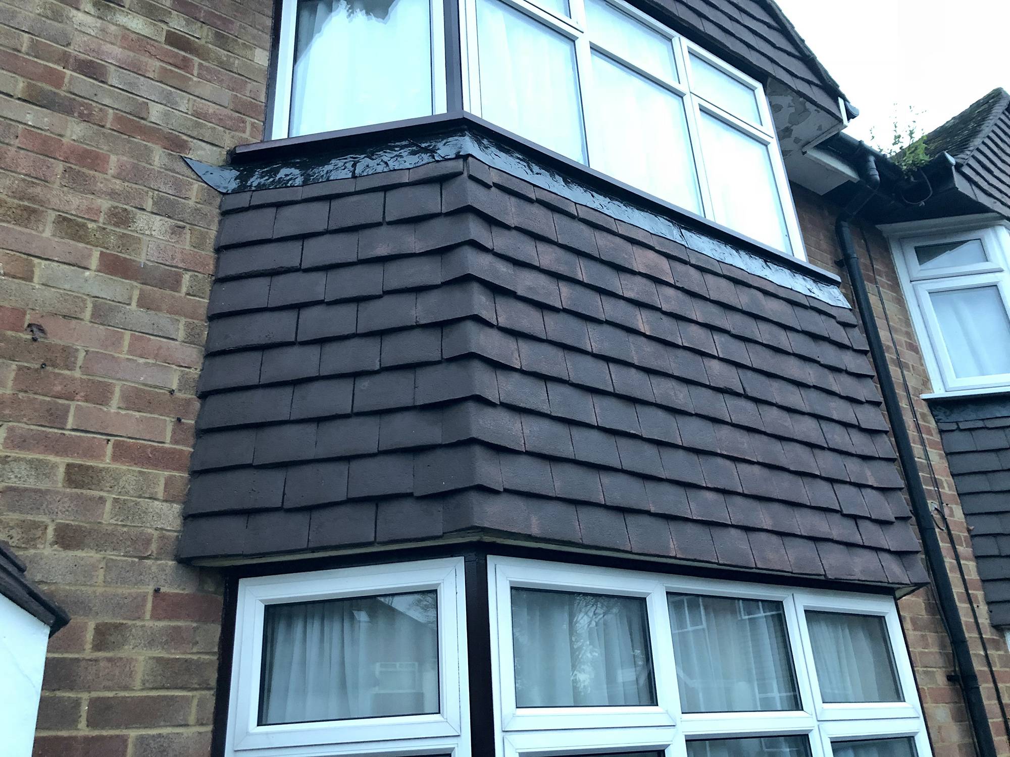 What type of exterior siding tiles are these? Home Improvement Stack