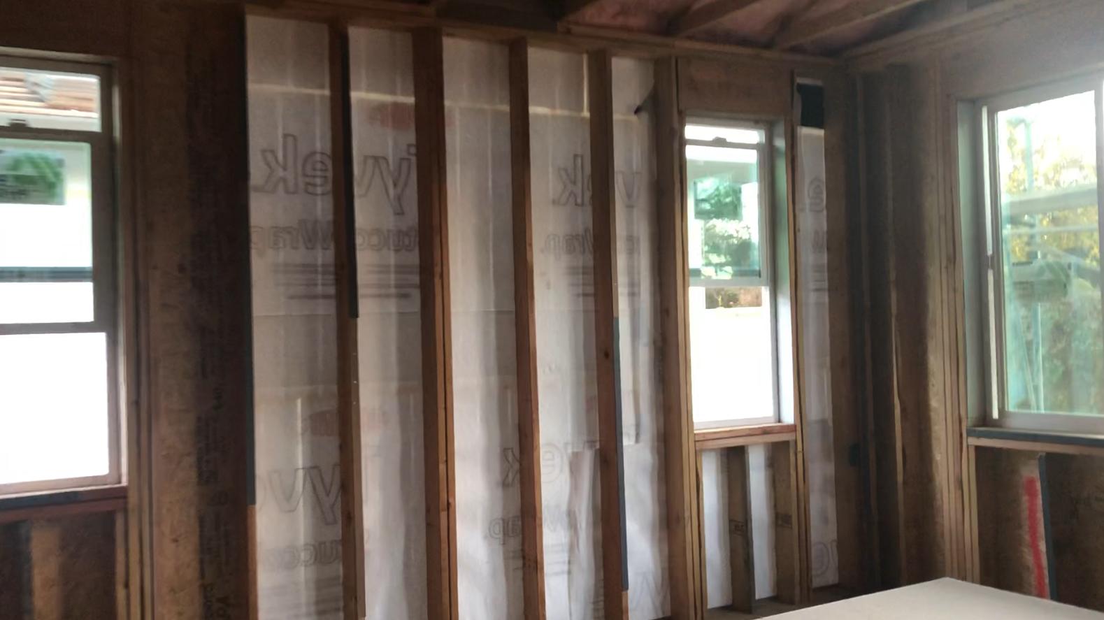 walls Why is my new home only sheathed with rigid material at some