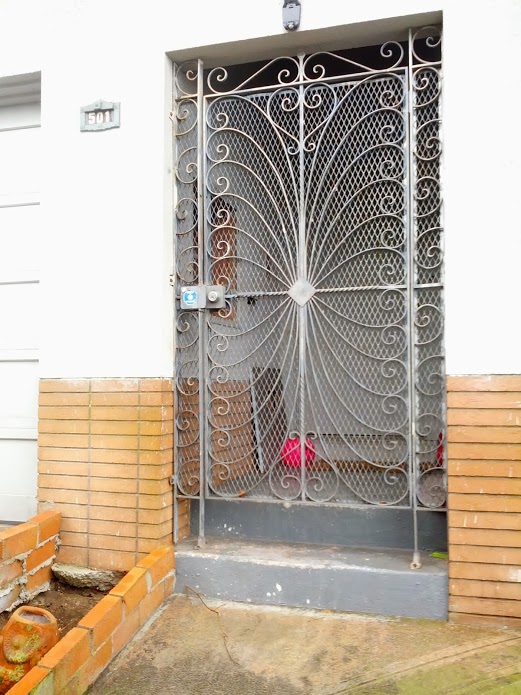 repainting Painting an old metal gate with some corrosion Home