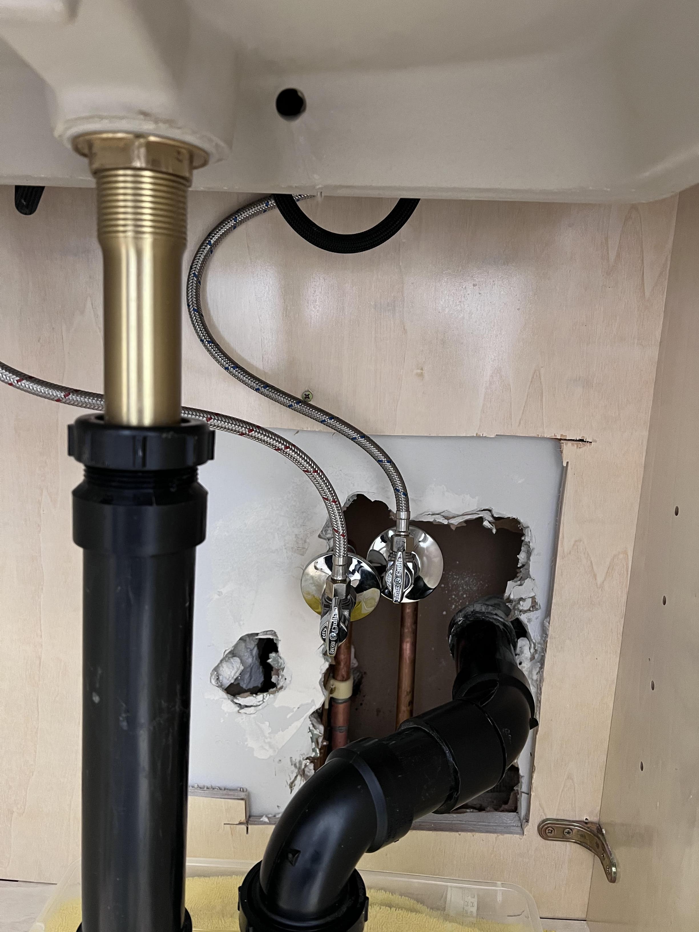 plumbing Why is water leaking from this hole under the sink? Home