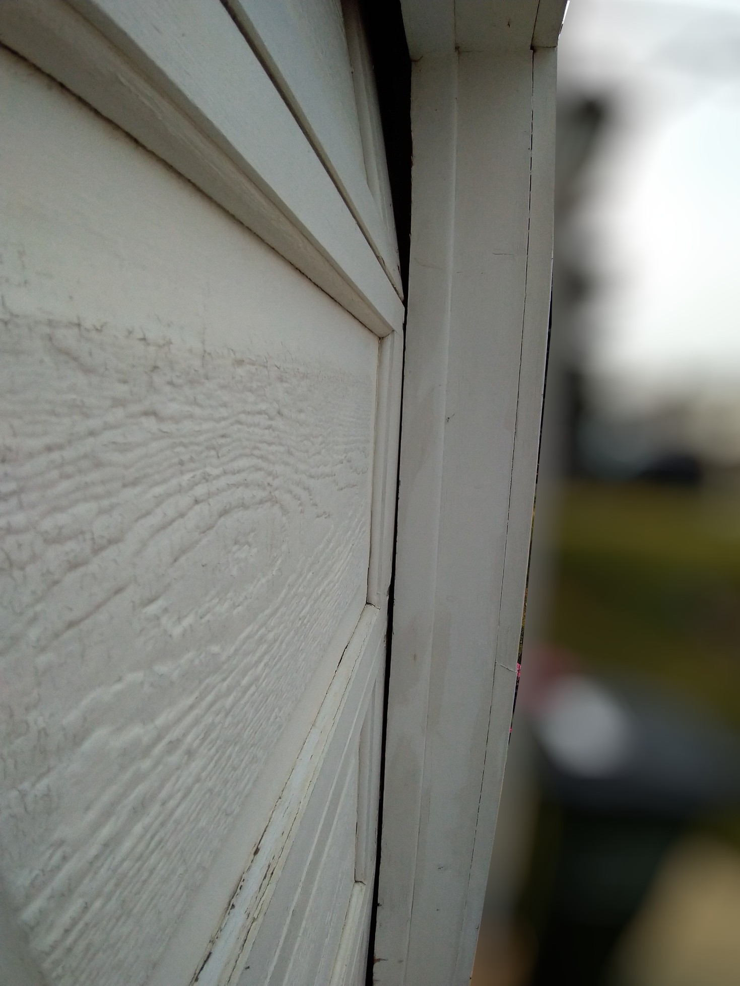 How to fix the garage door to stop it from rubbing with the frame