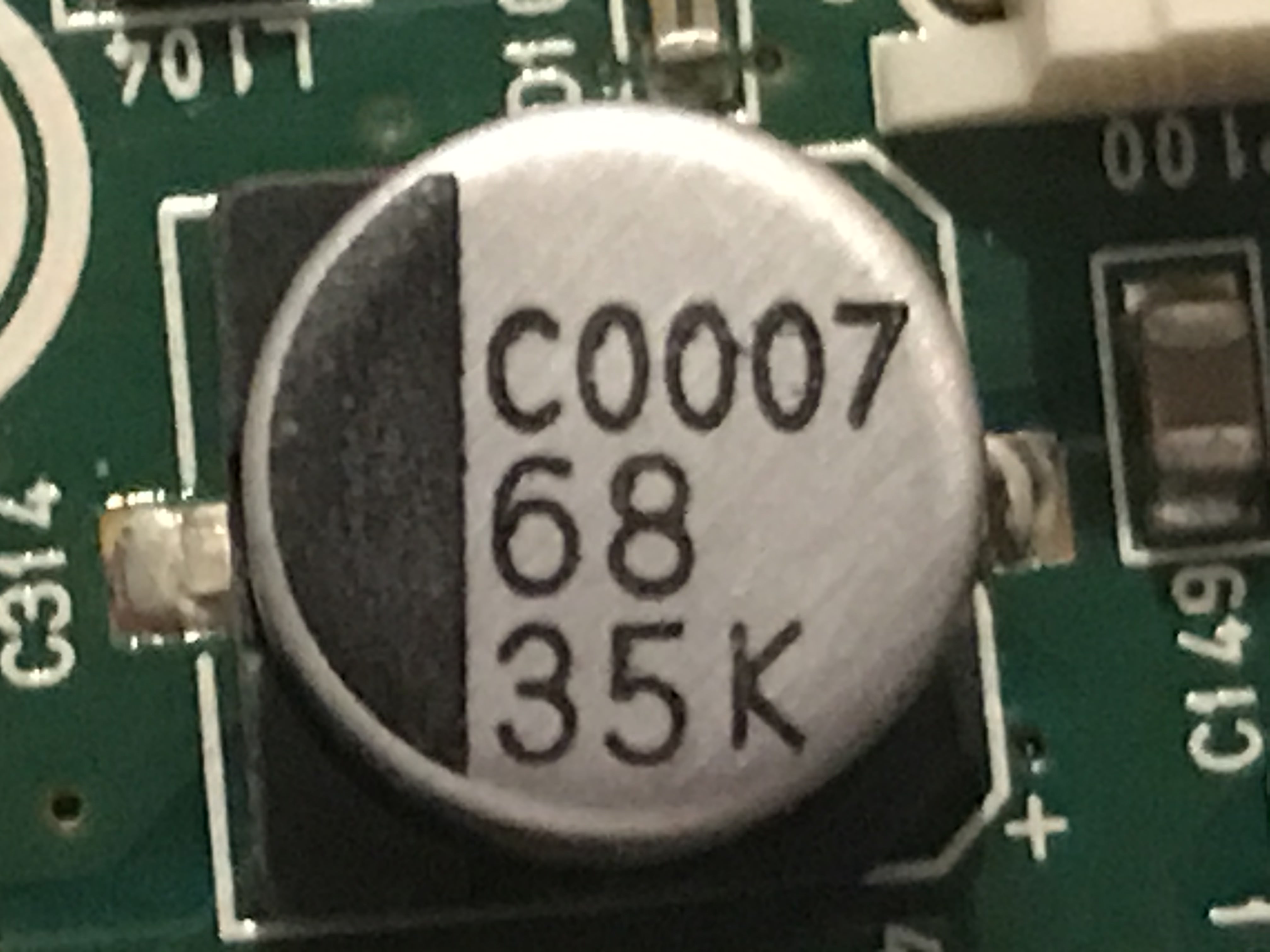 identification Need help identifying capacitor values from monitor