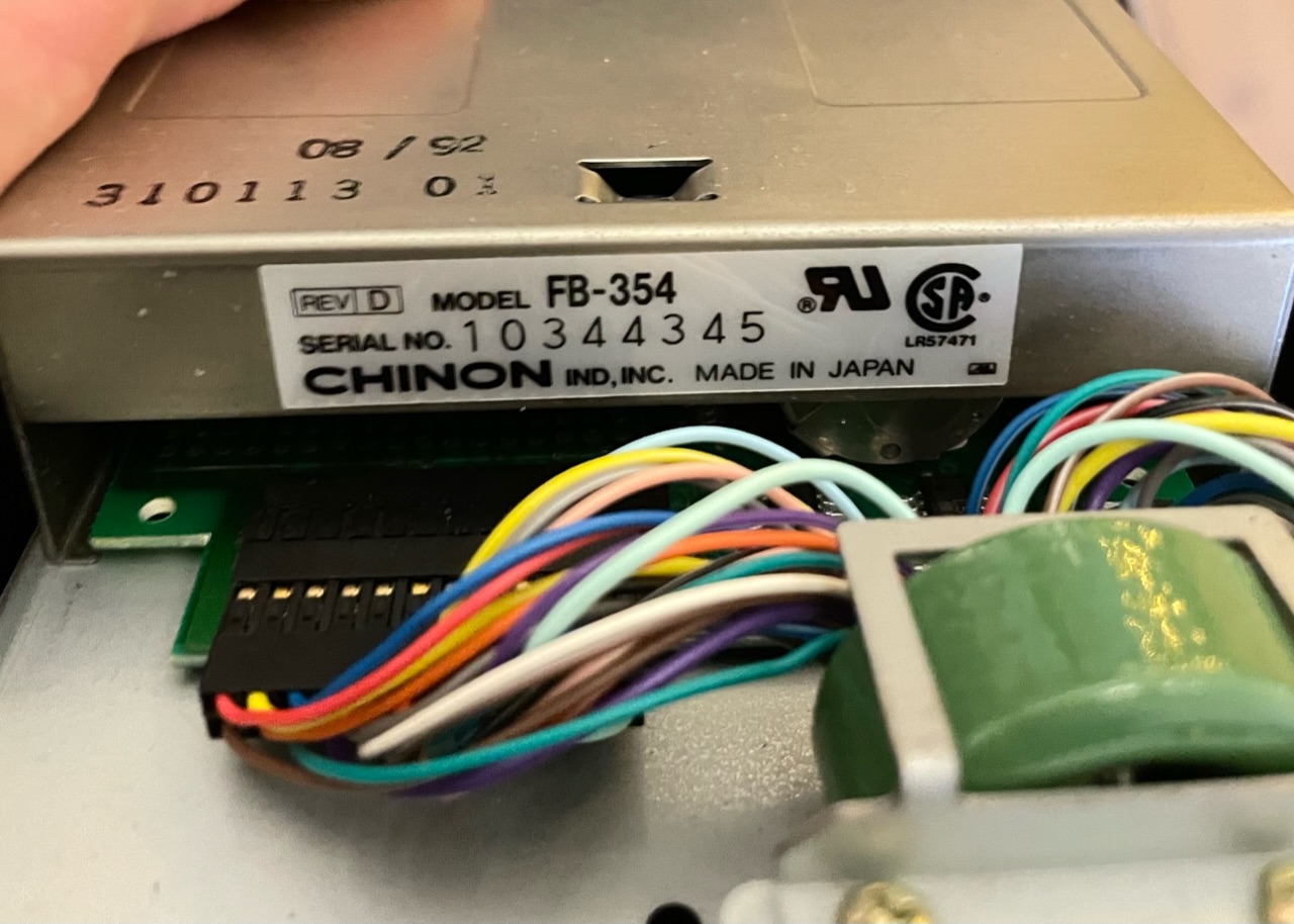 amiga How can I replace the floppy drive mechanism in a A1011/CD