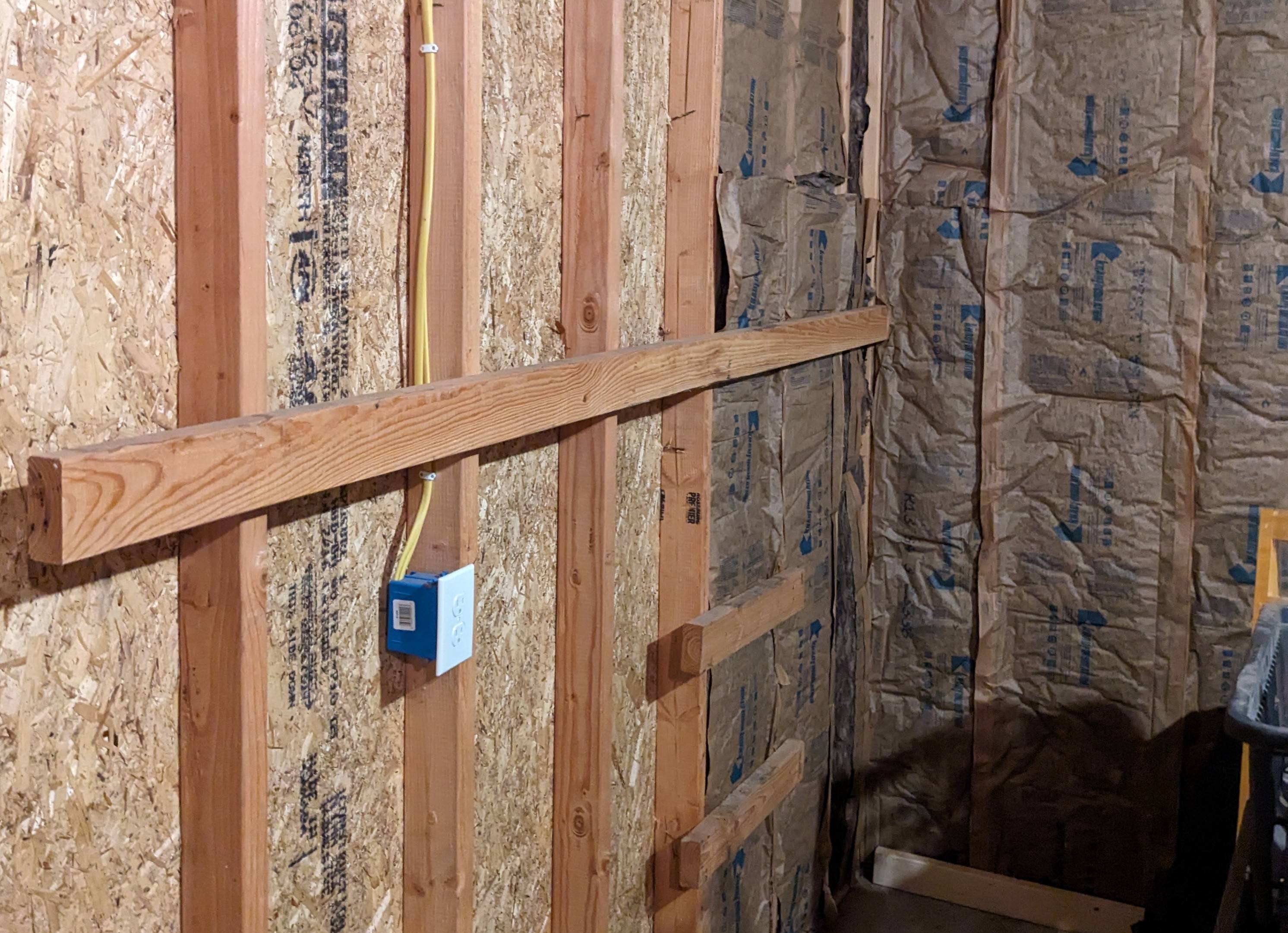 framing - What are these horizontal boards screwed to my garage wall