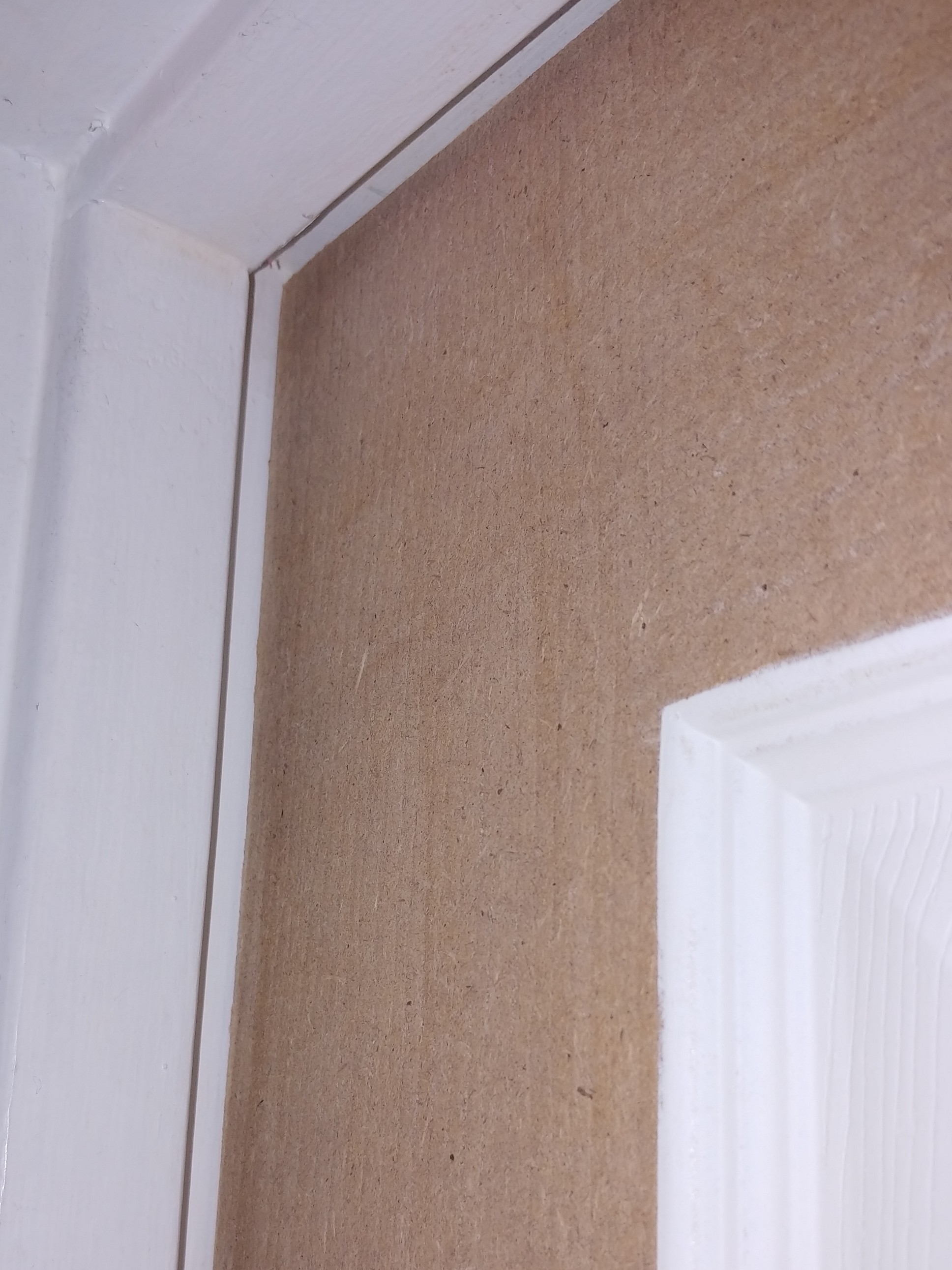 Doors Door not flush to door stop at the top but is at the bottom