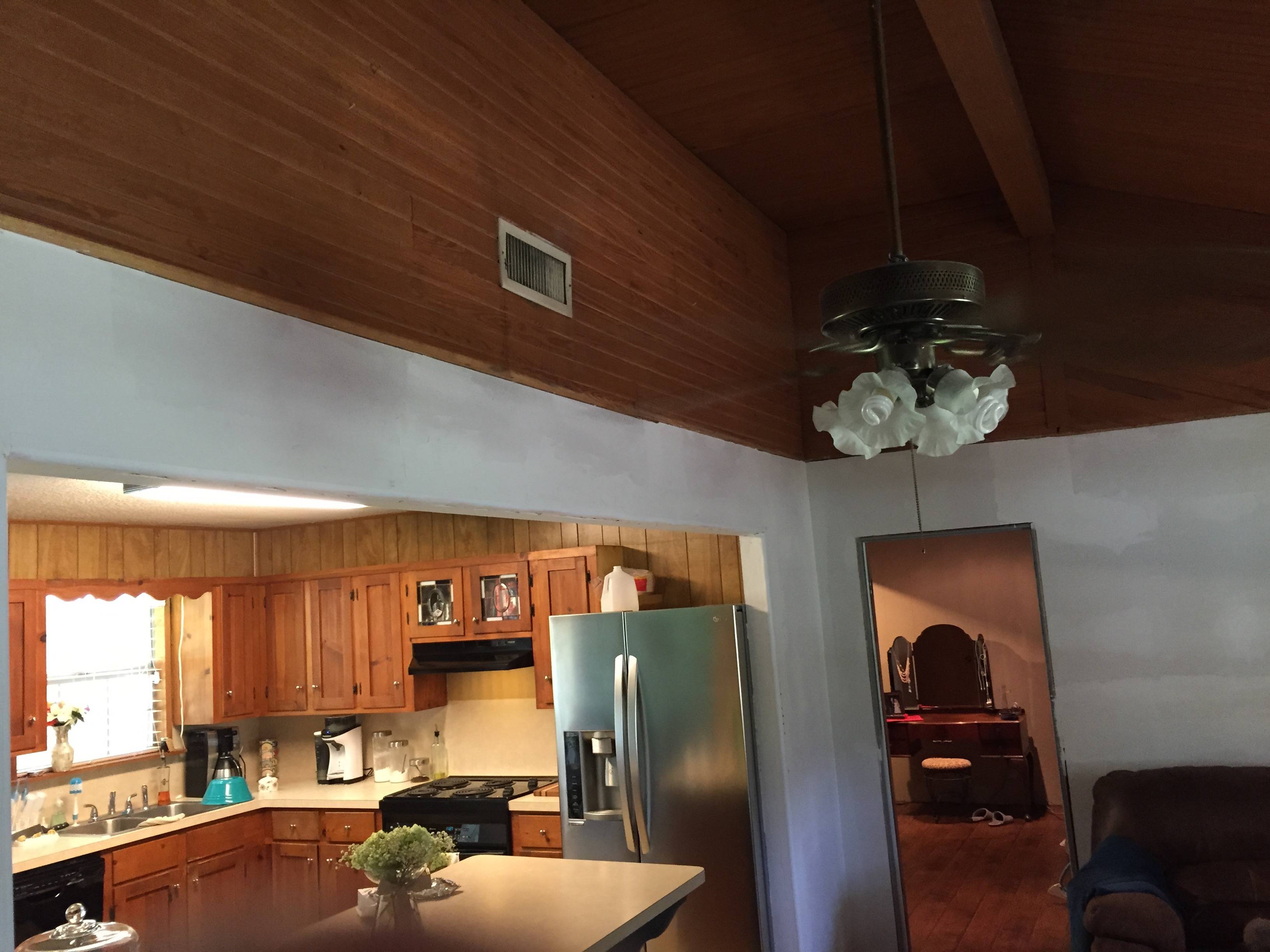 trim How is a transition between drywall and wood typically handled