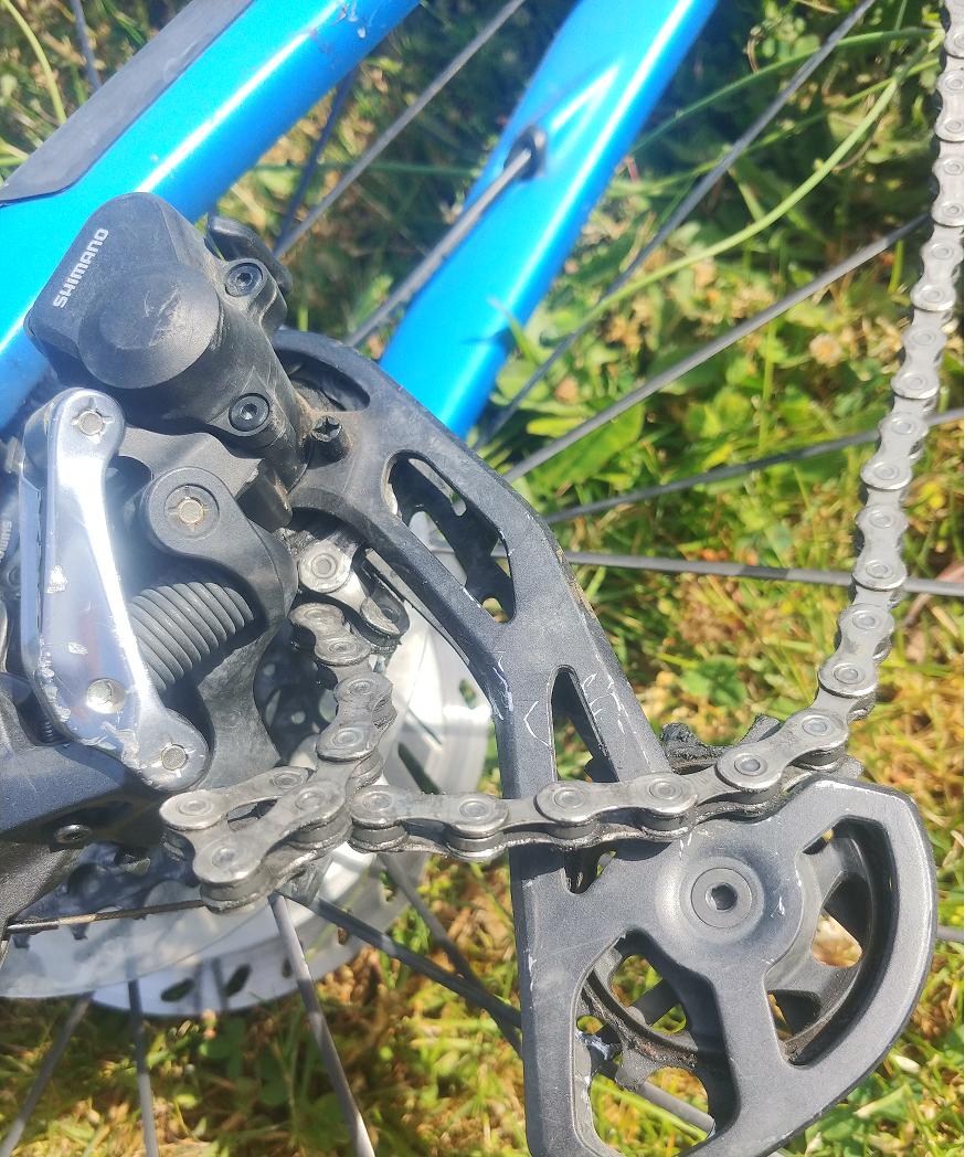 [SOLVED] Chain popped out of derailleur and wrapped around itself how