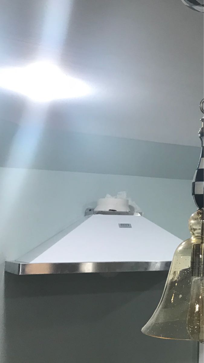 Cutting stainless steel vent chimney to fit sloped ceiling Home Improvement