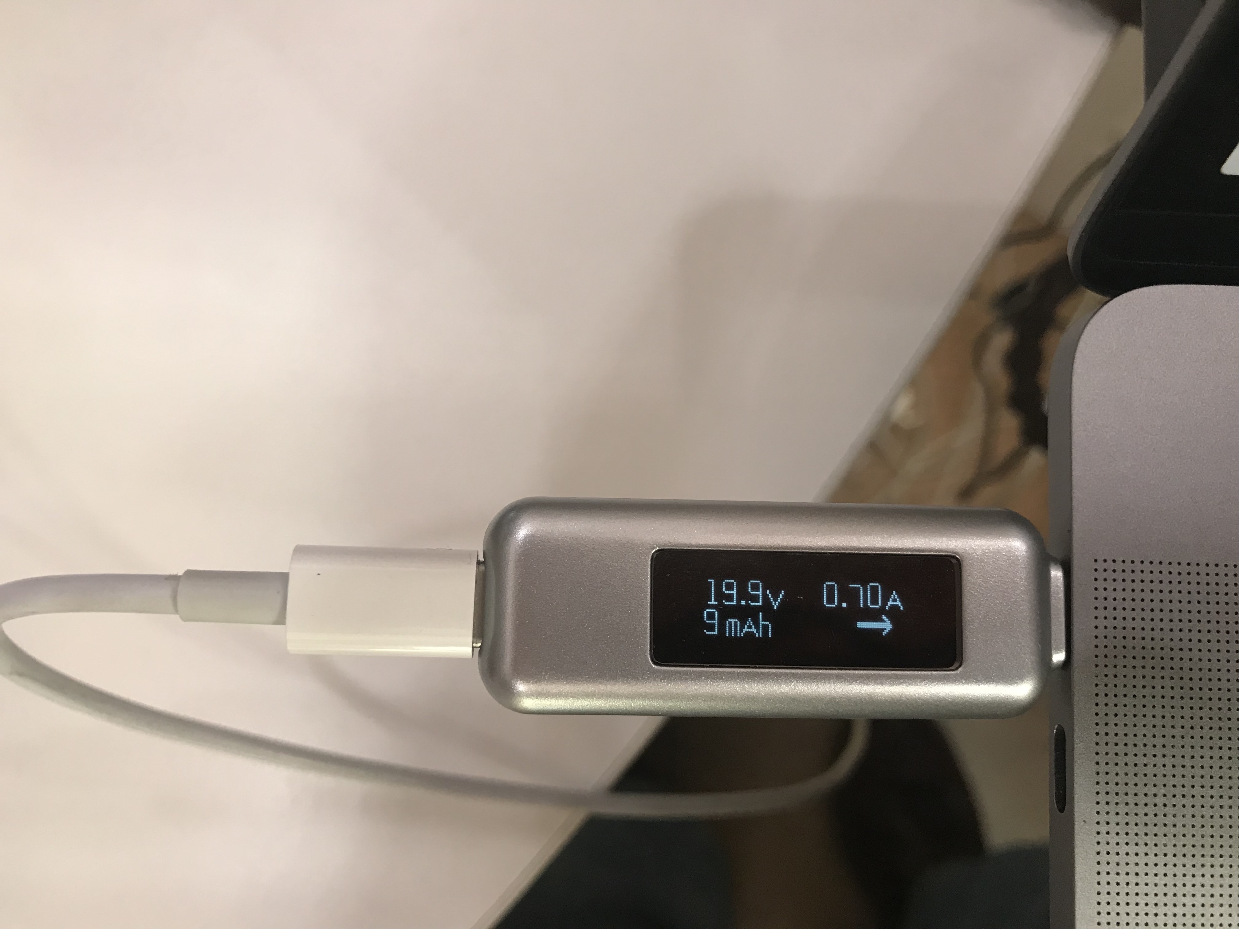 Macbook battery runs flat while "charging" with nearly