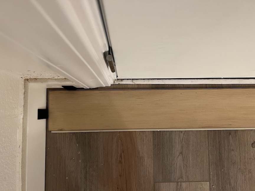 flooring Vinyl plank installation near exterior doorway Home