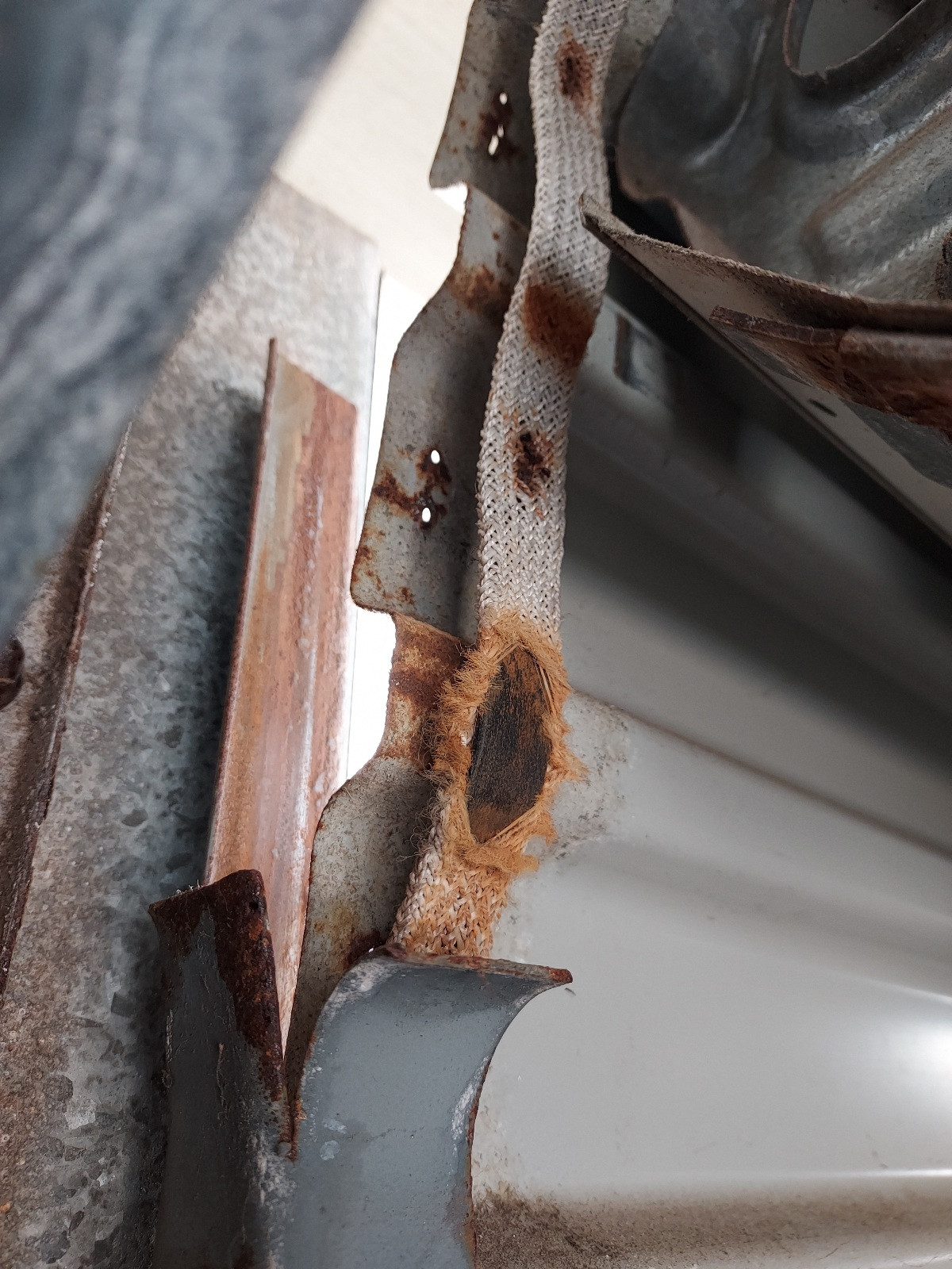 Identify and replace roller door side track tape Home Improvement