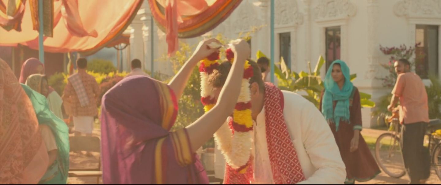 marvel Why is there a lady putting flowers on Tony Stark