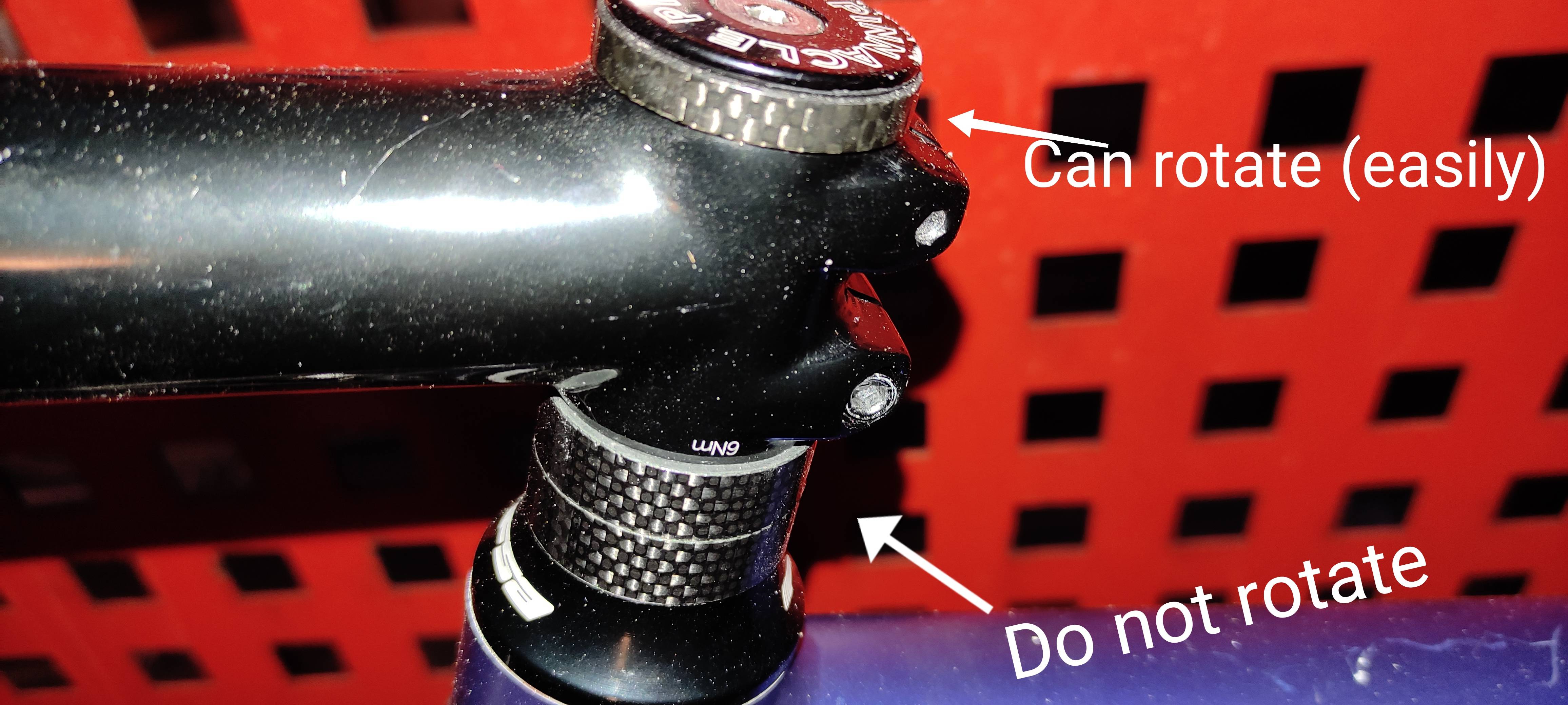 Road bike headset the spacer above the stem can rotate but not the