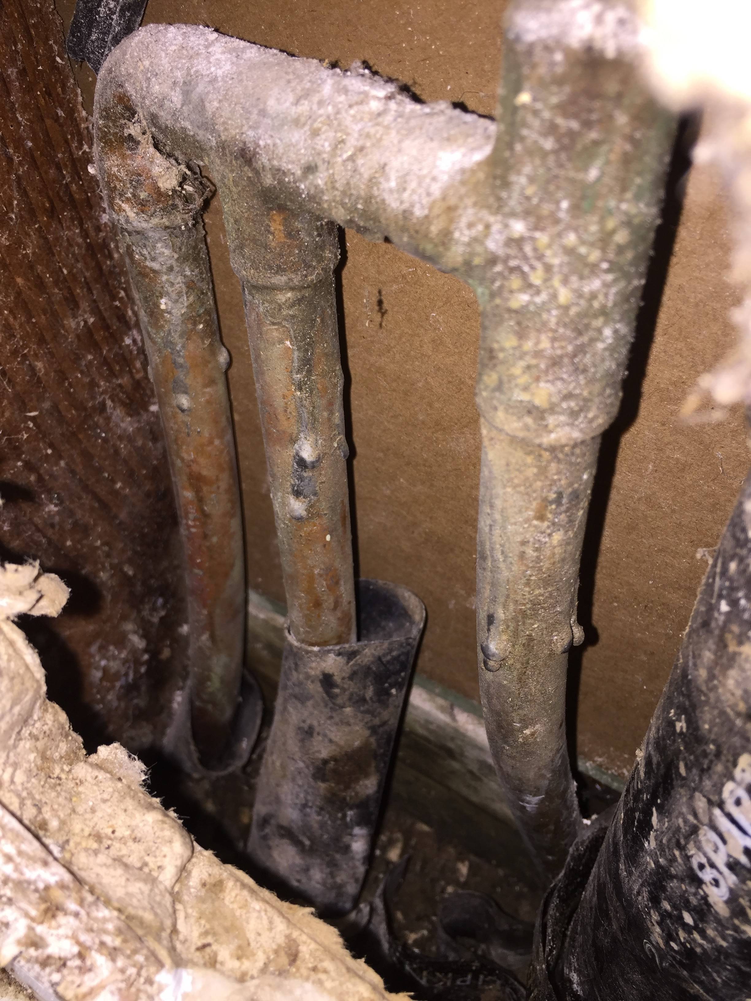 bathroom Leak underneath flooring, hot tiles, please help! RESOLVED