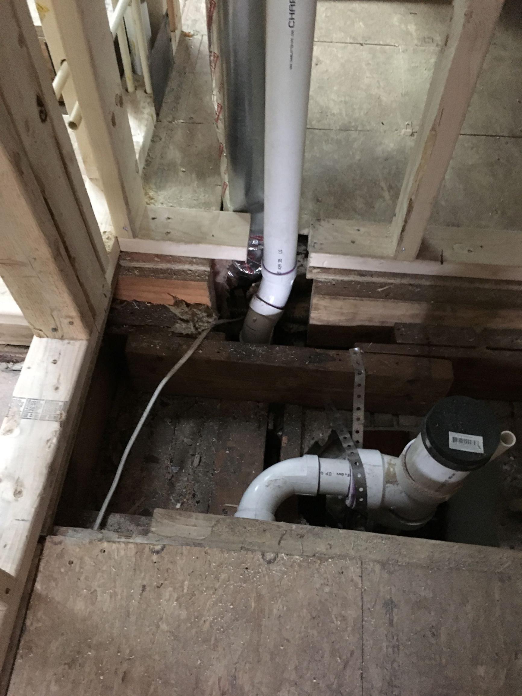 bathroom How to repair cut joist around pipe *after* framing and