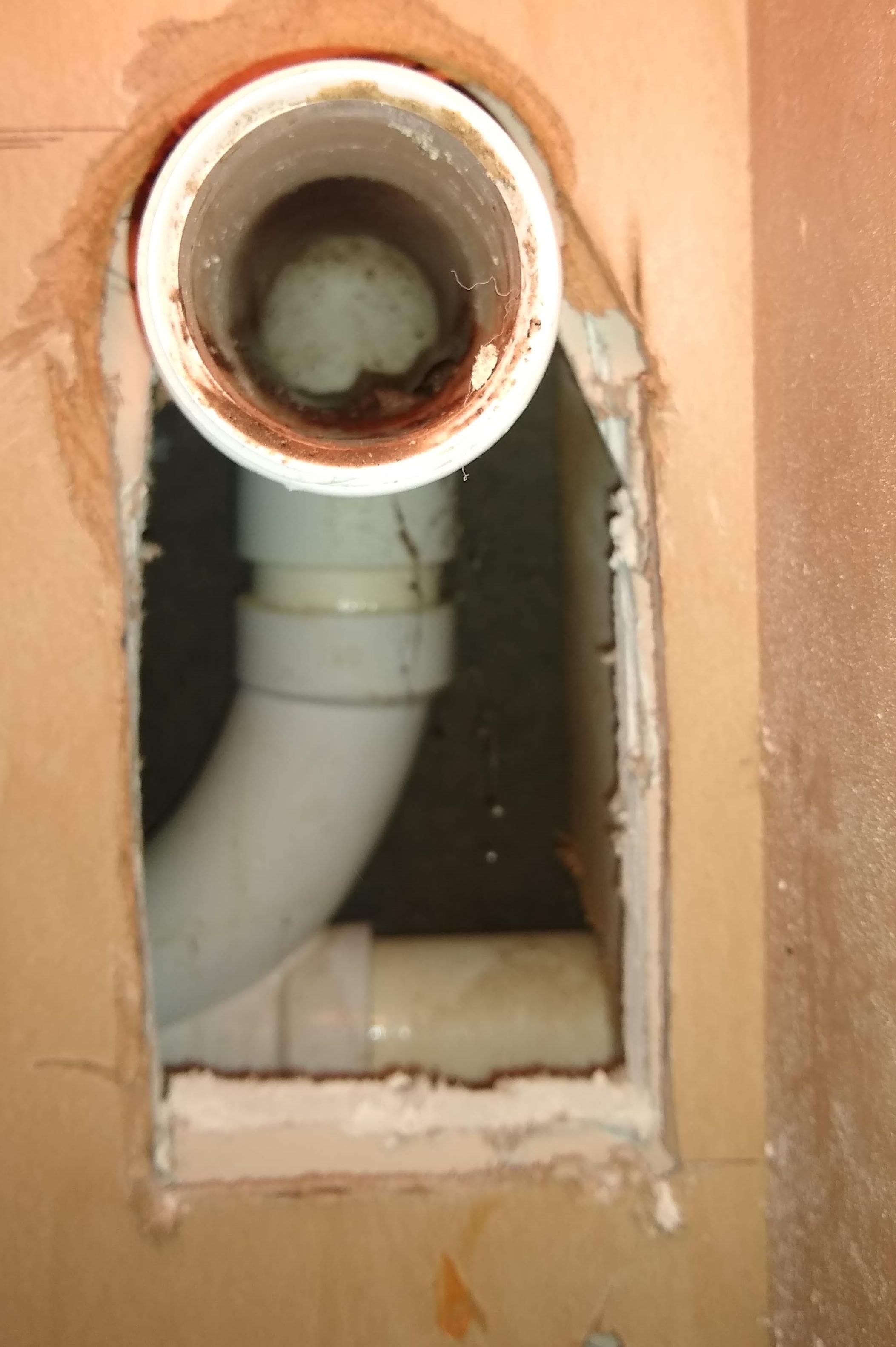 plumbing New garbage disposal drain is a bit higher than stubout on