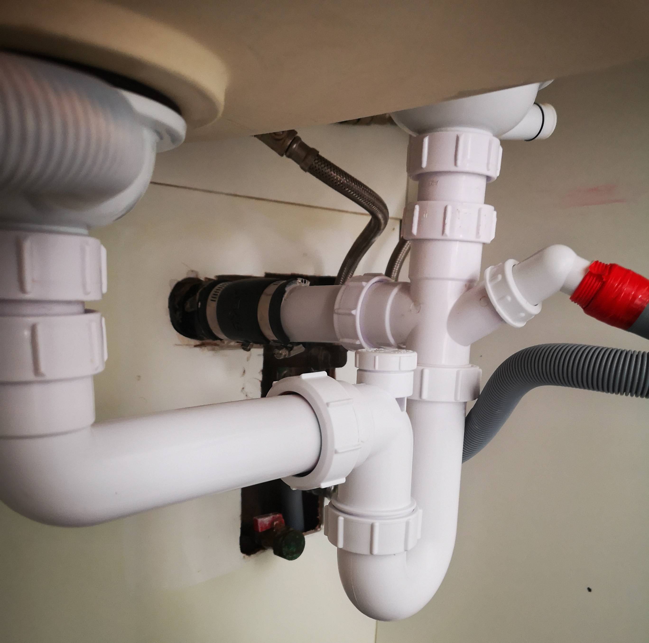 plumbing How should I correct the drains for my dual sink and washing