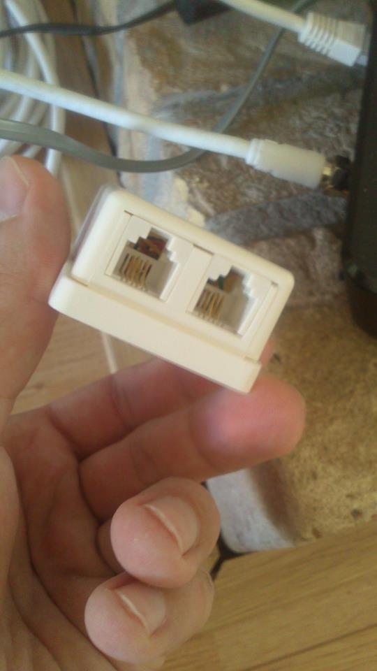 router converting COAX to phone for ADSL Super User