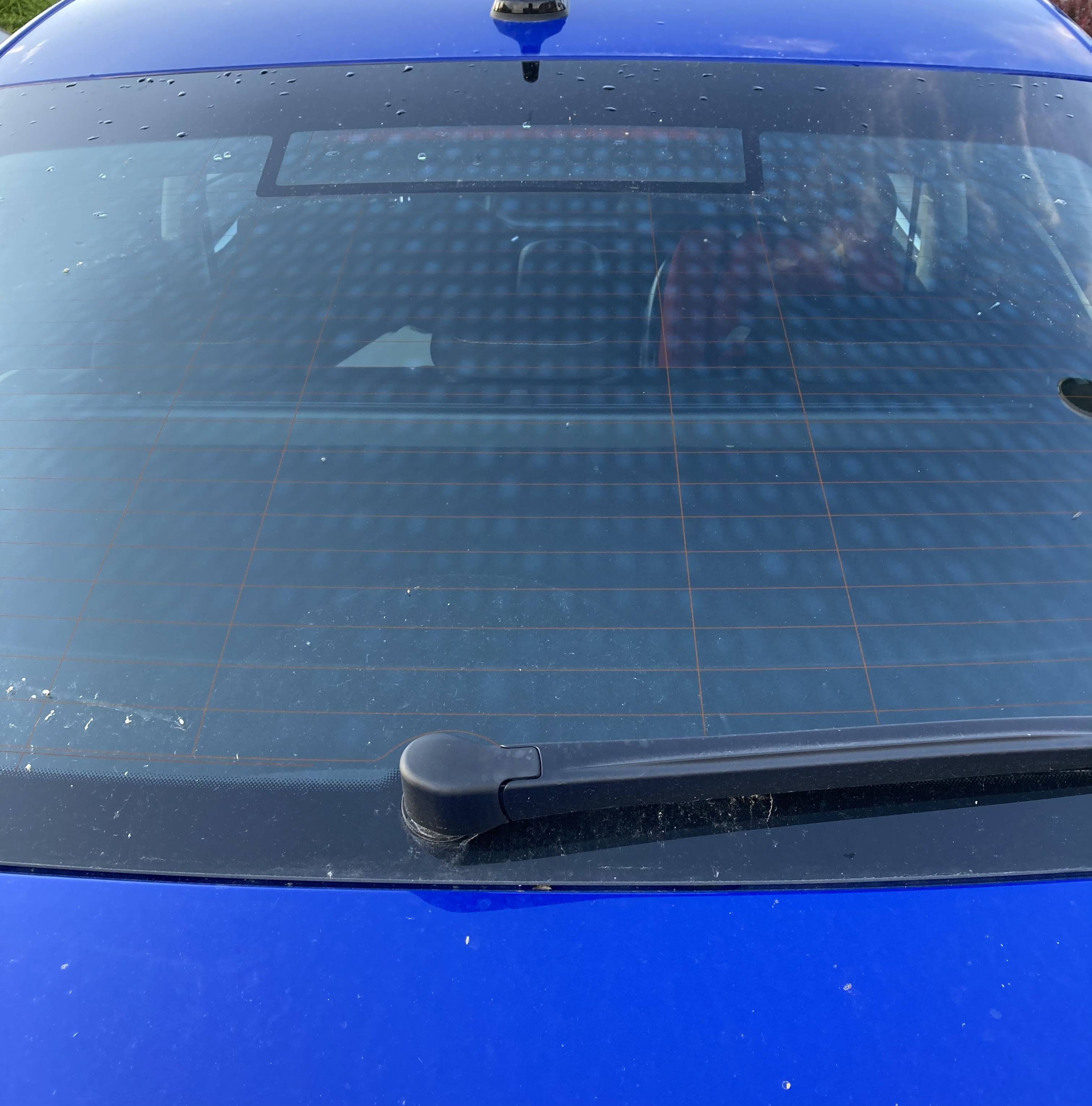 What is the checkered pattern on the rear window? - Motor Vehicle