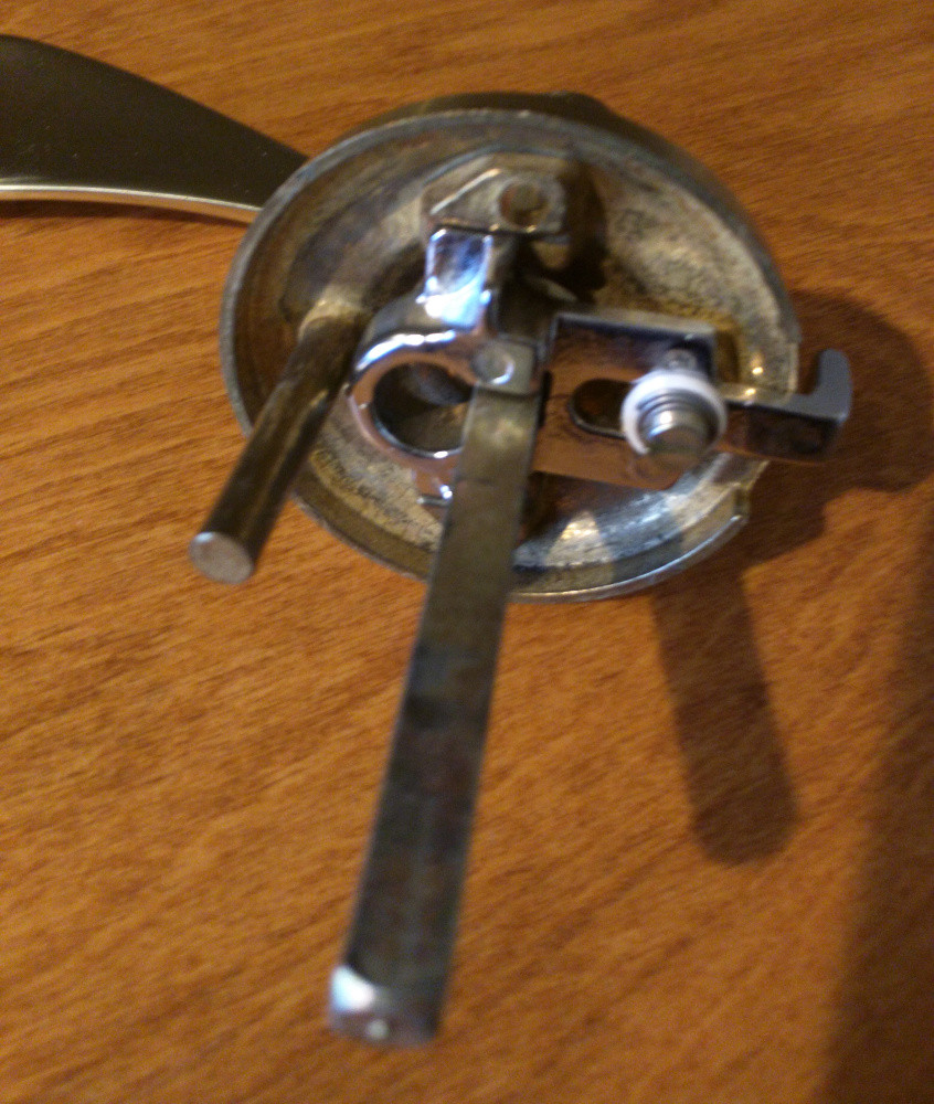 Unlock an Omnia privacy lock with sliding mechanism from the outside of