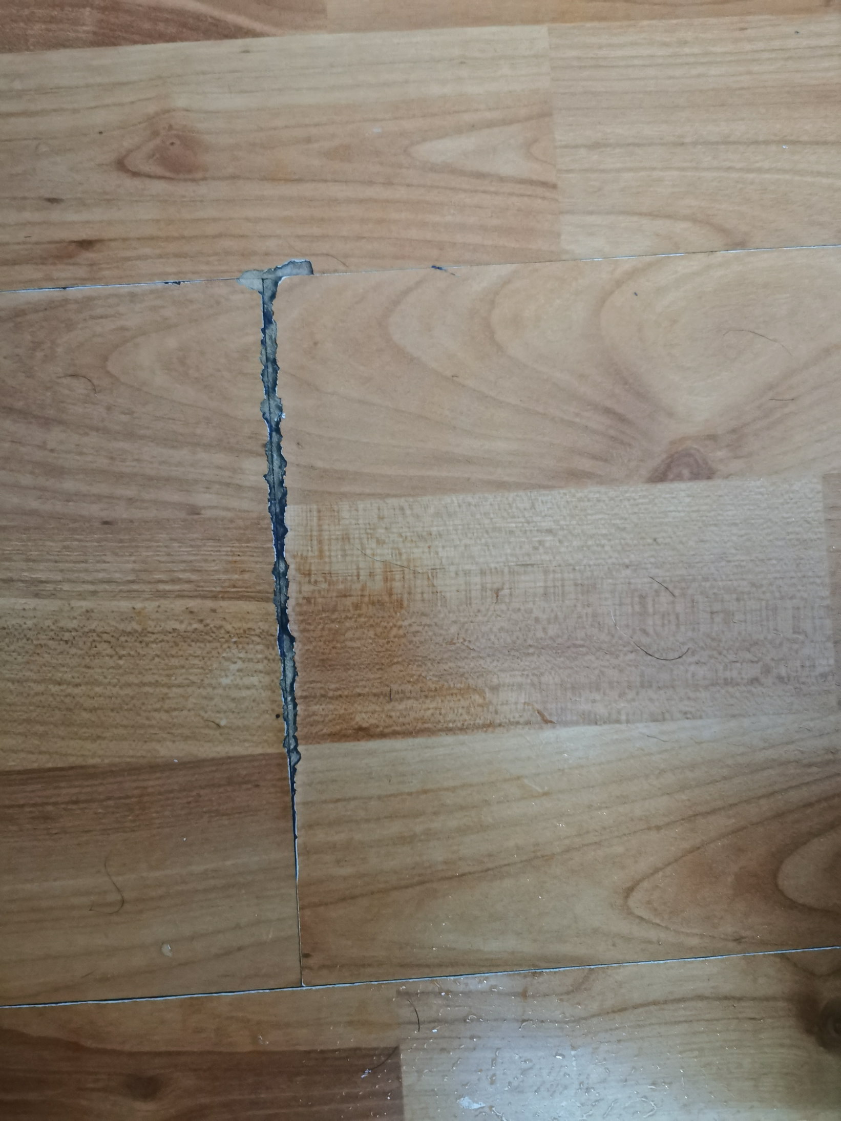 How can I fix pvc floor damage like this? Home Improvement Stack Exchange