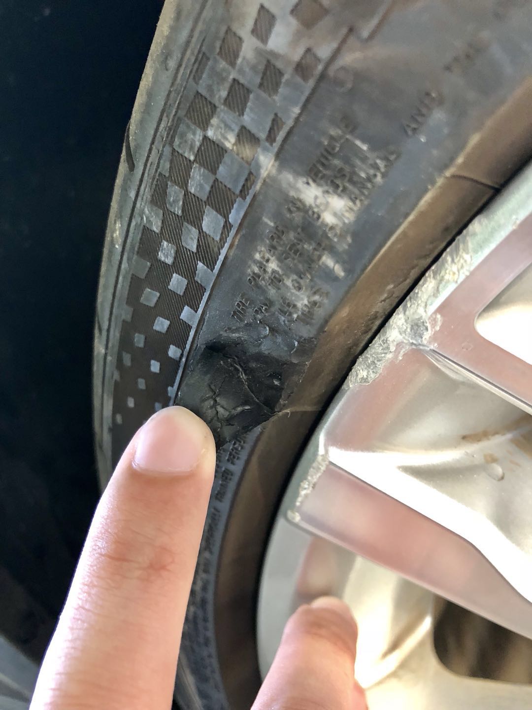car Hit a curb, the curb cut off a piece of the tire. Will it needs