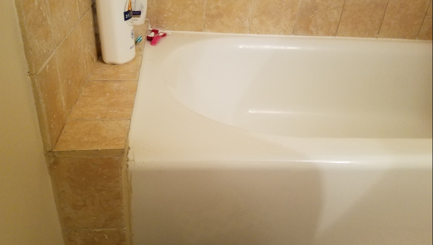 bathroom installing sliding shower door when width is larger than tub