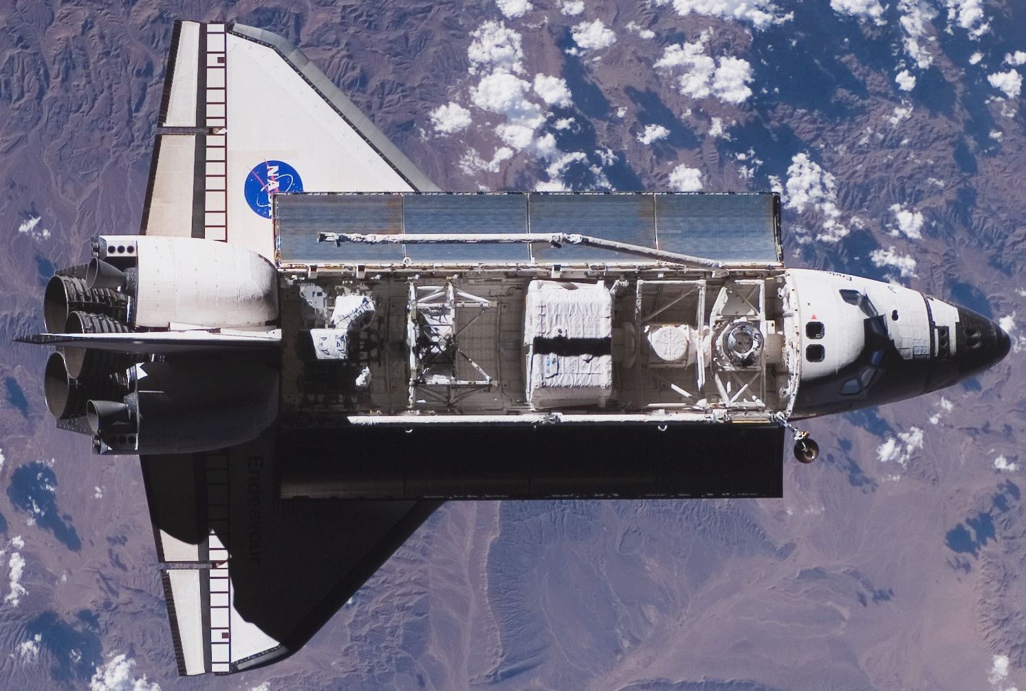 materials Why aren't the ISS's nor Space Shuttle's radiators black