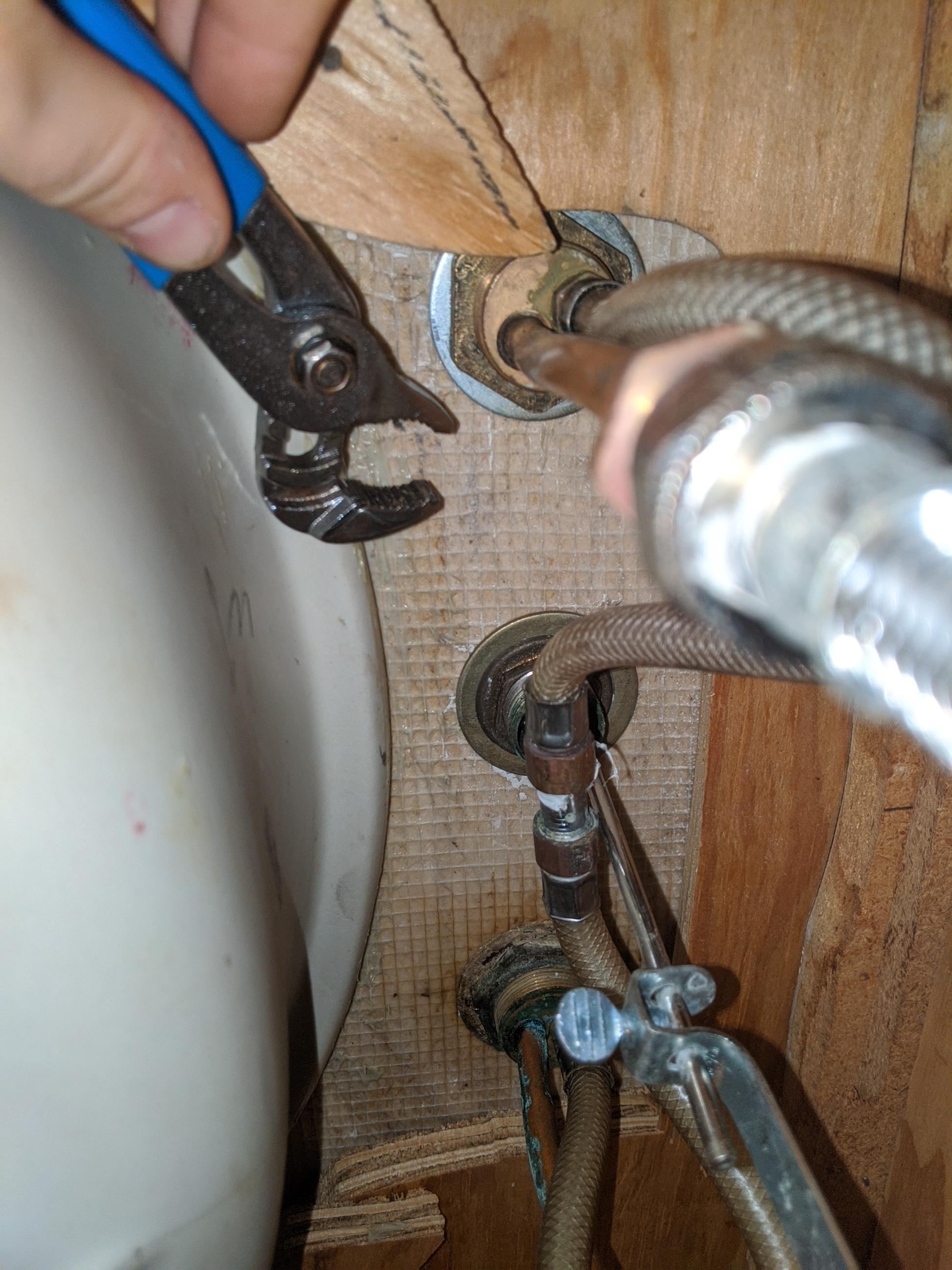 Plumbing - How Can I Unscrew The Faucet Nuts In The Tight Space Behind My Sink Basin? - Home Improvement Stack Exchange