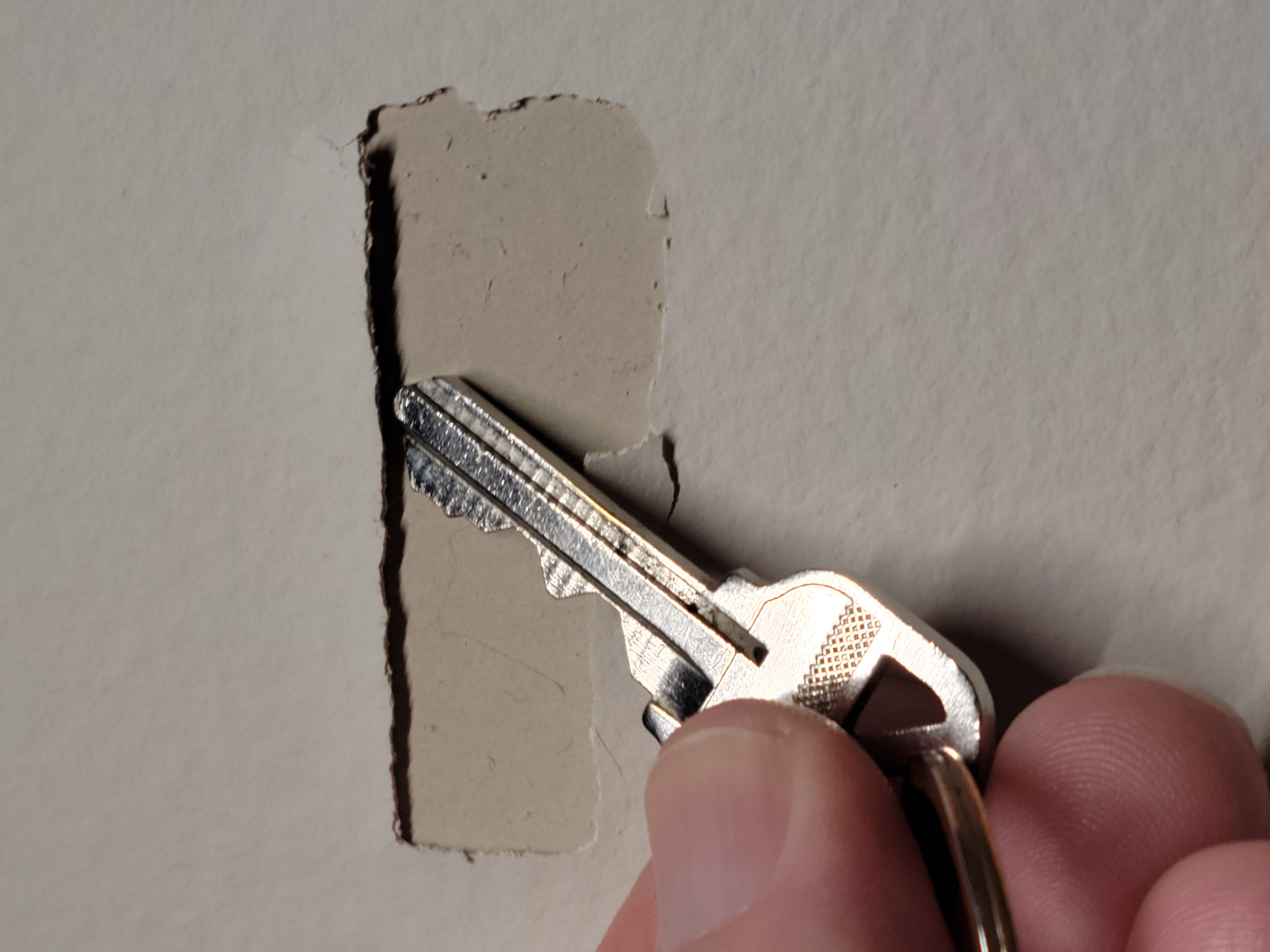 drywall What do I need to do and repair where these 3M strips pulled