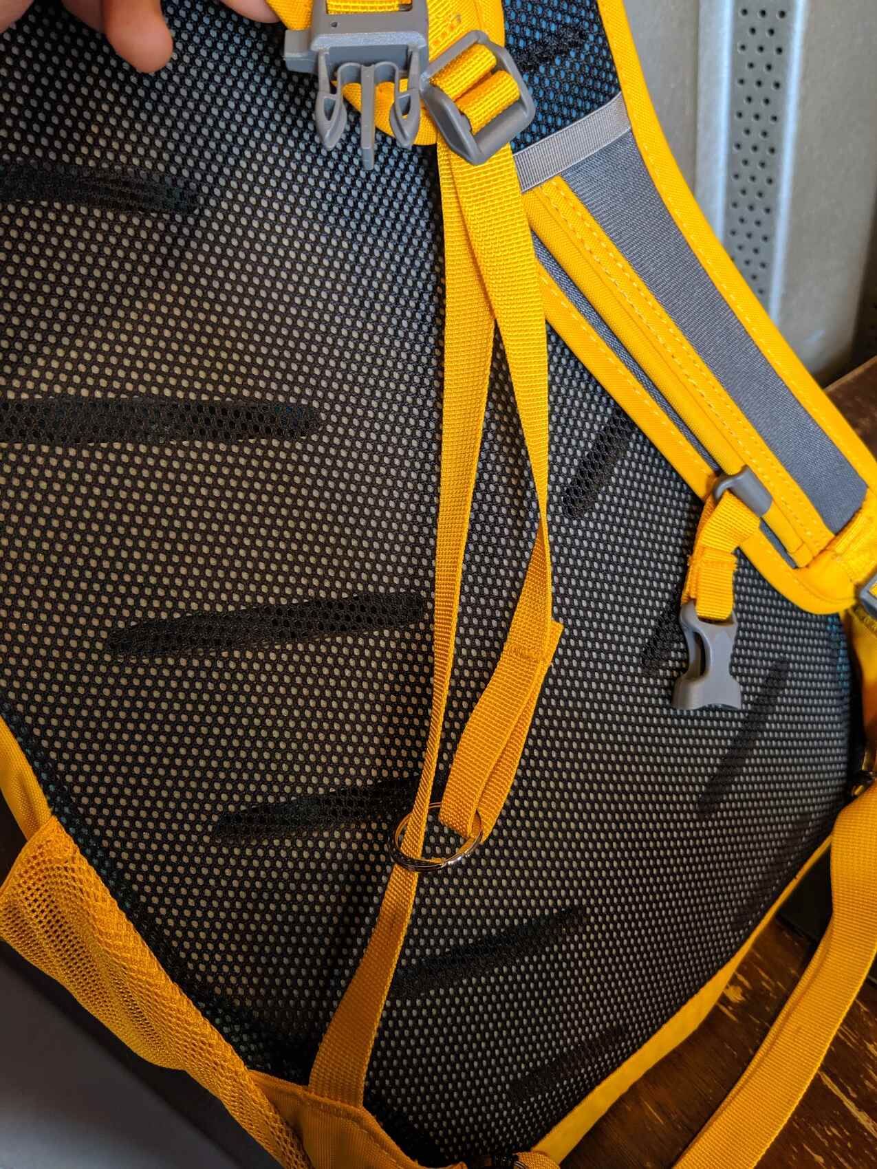 backpacking How do I fold in / tidy up the straps on my rucksack