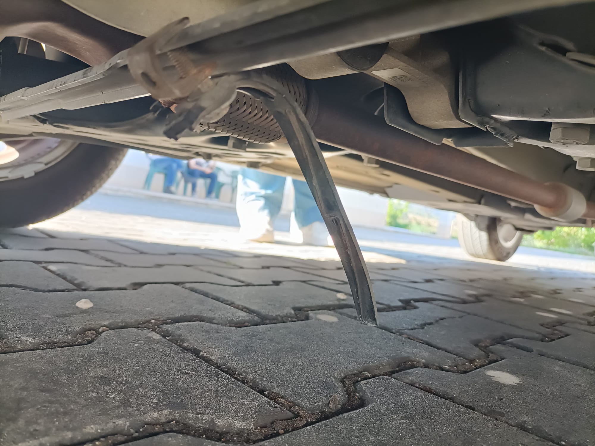 What is this rubber strip dangling below the car? Q&A Answertion