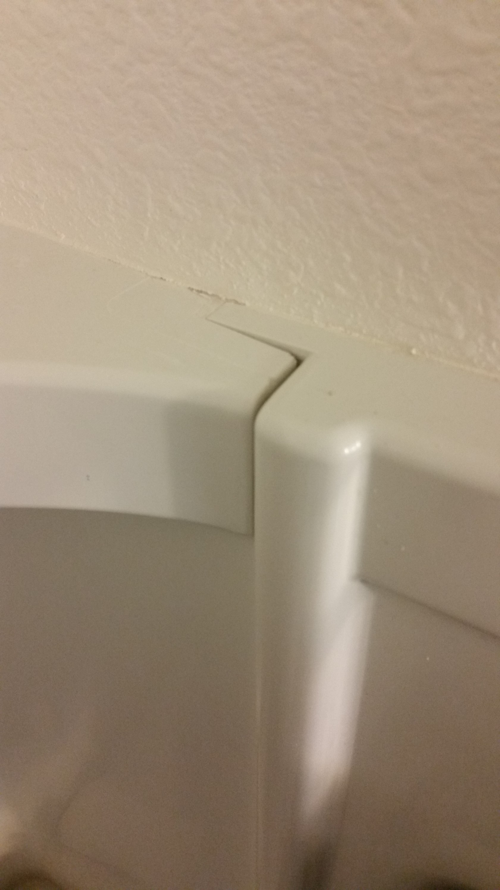 plumbing Caulking Vertical Seams in Three Piece Shower/Bathtub Home