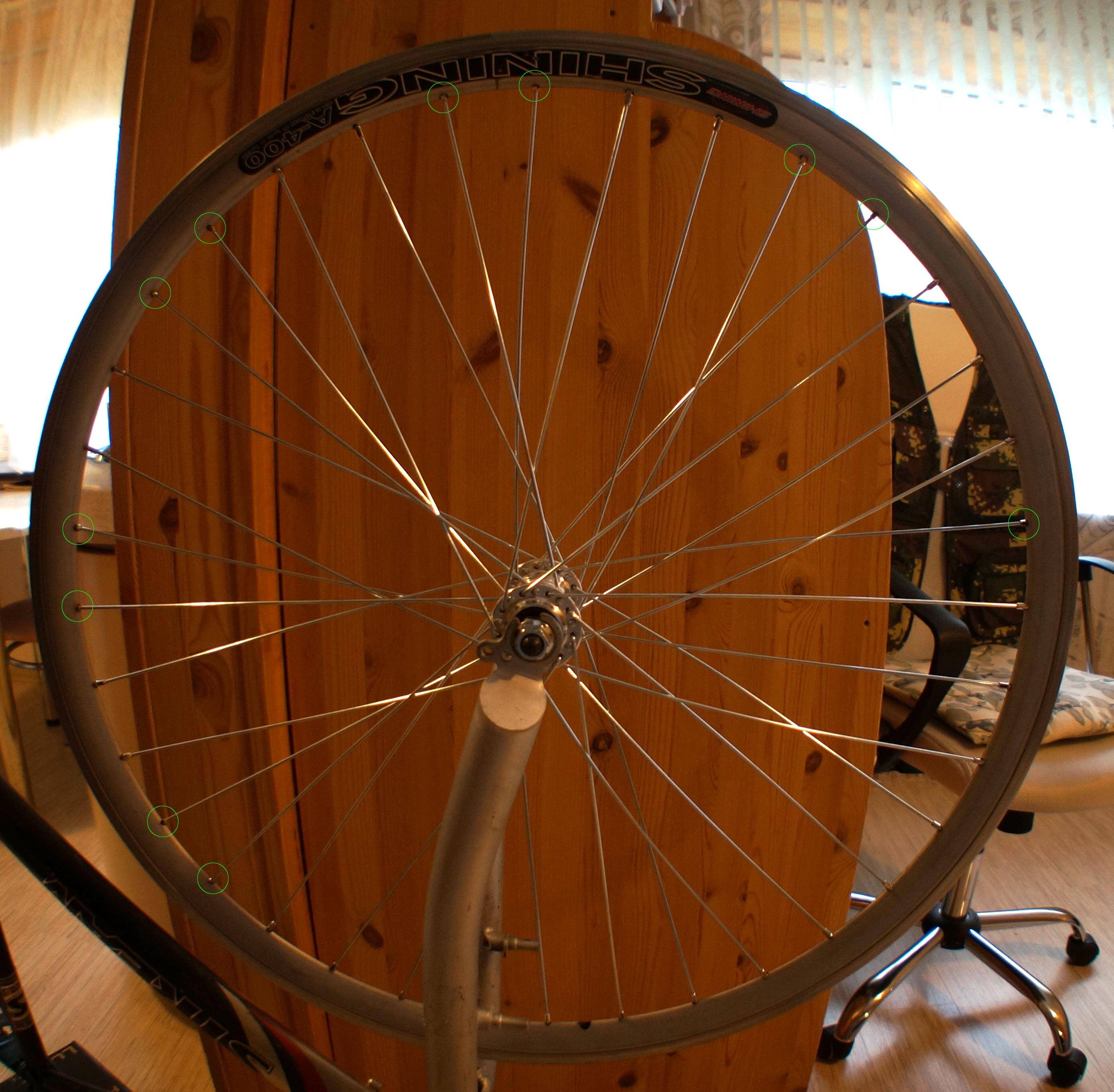 wheel building Spokes go further inside rim than others Bicycles