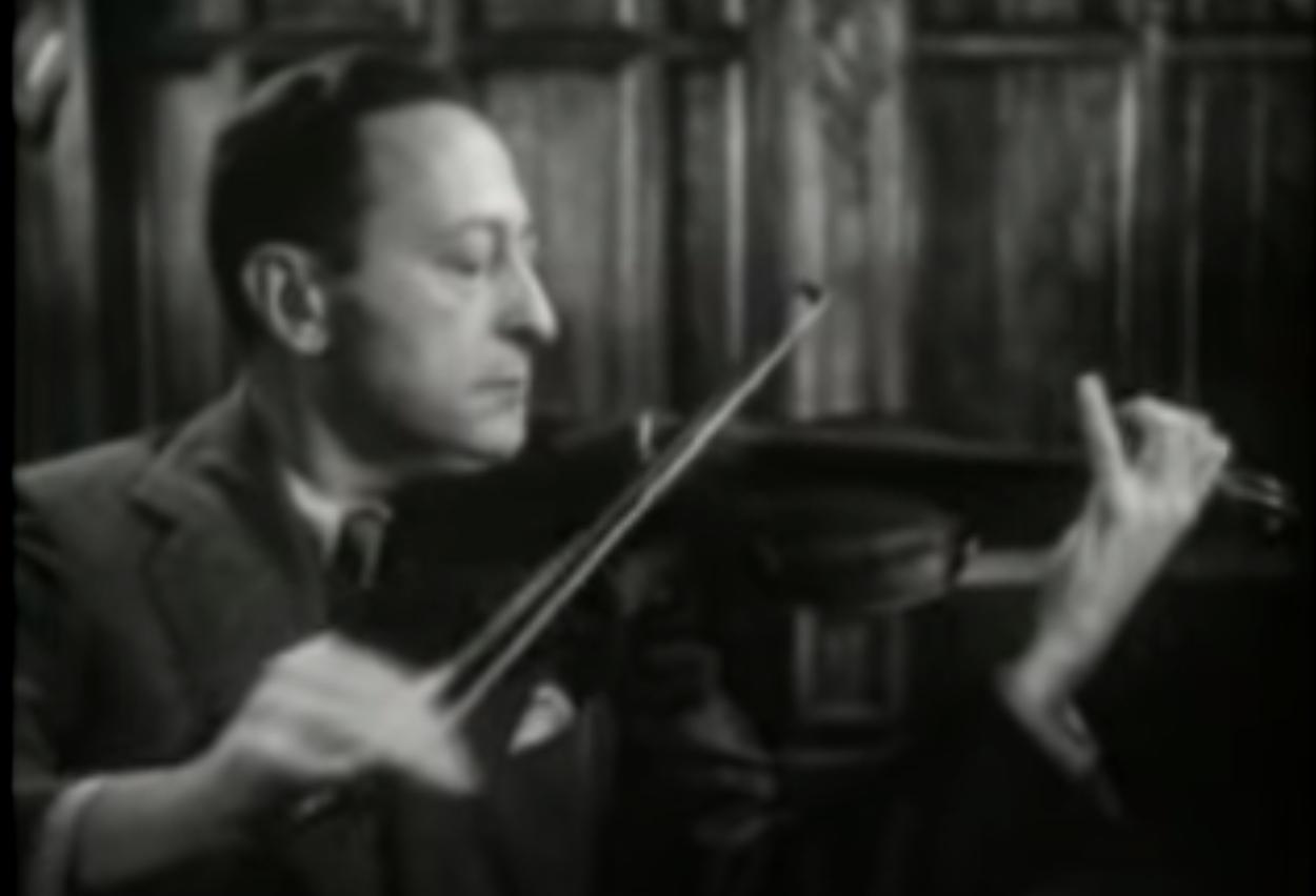 technique Why tilt a violin bow inward? (I.e., stick towards bridge