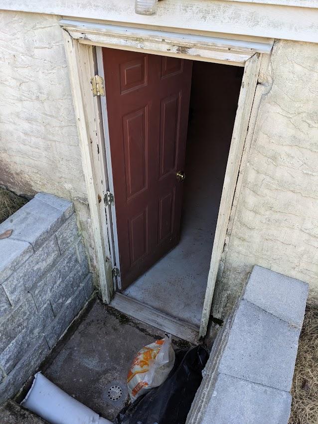 Which way is best to reframe/reinstall this door? Does it need to be