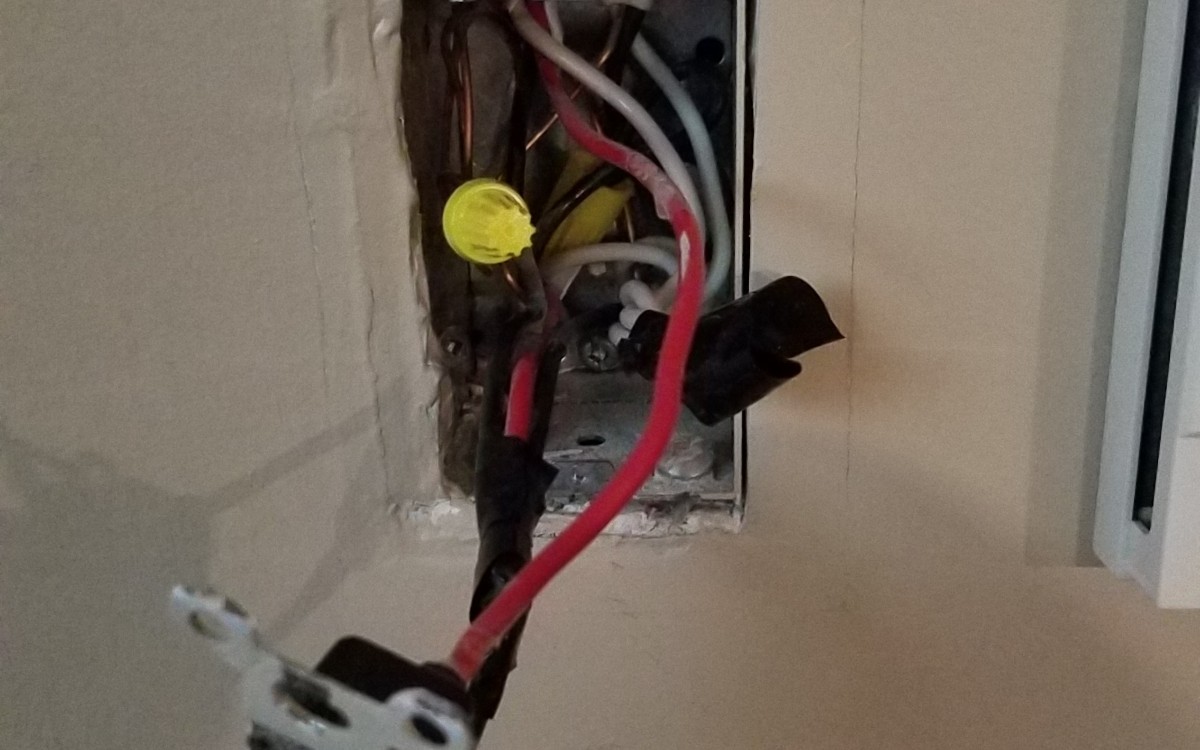 electrical Red wire spliced into a bundle of blacks? Home